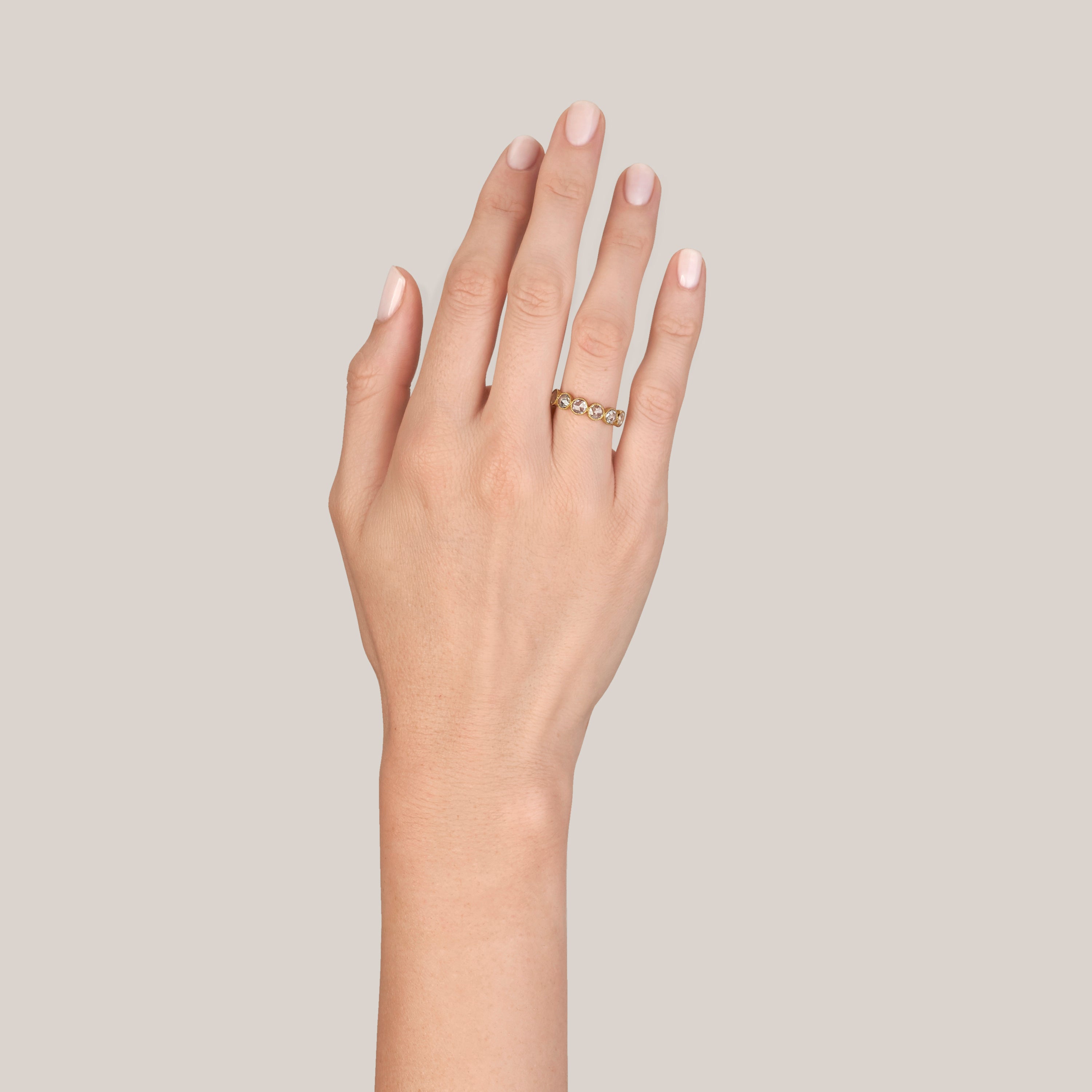 SINGLE STONE LARGE ROSE CUT GABBY HALF BAND BAND | Approximately 0.90ctw rose cut diamonds set in a handcrafted bezel set half-eternity band. Approximate band width 4.8mm. Please inquire for additional customization.