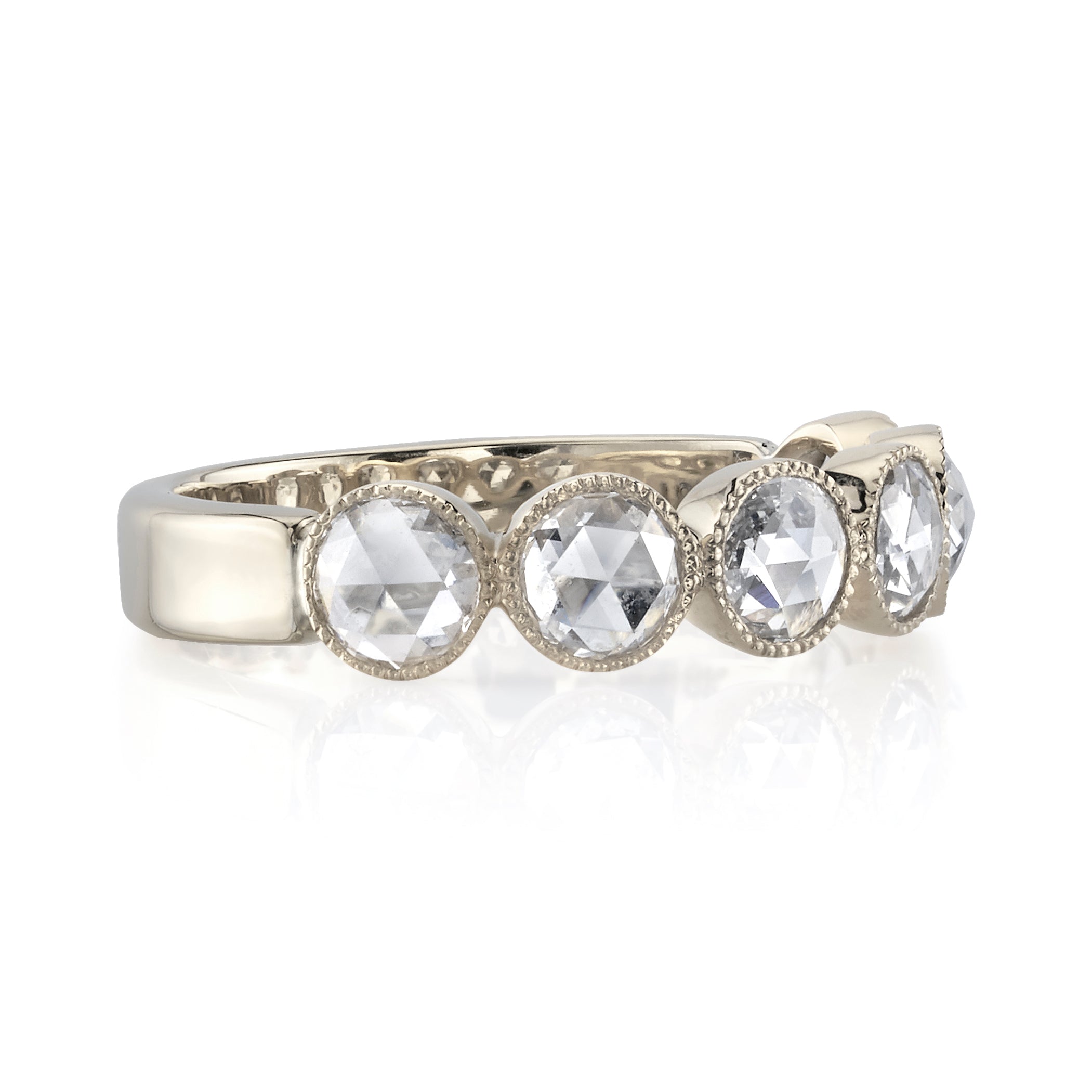 SINGLE STONE LARGE ROSE CUT GABBY HALF BAND BAND | Approximately 0.90ctw rose cut diamonds set in a handcrafted bezel set half-eternity band. Approximate band width 4.8mm. Please inquire for additional customization.
