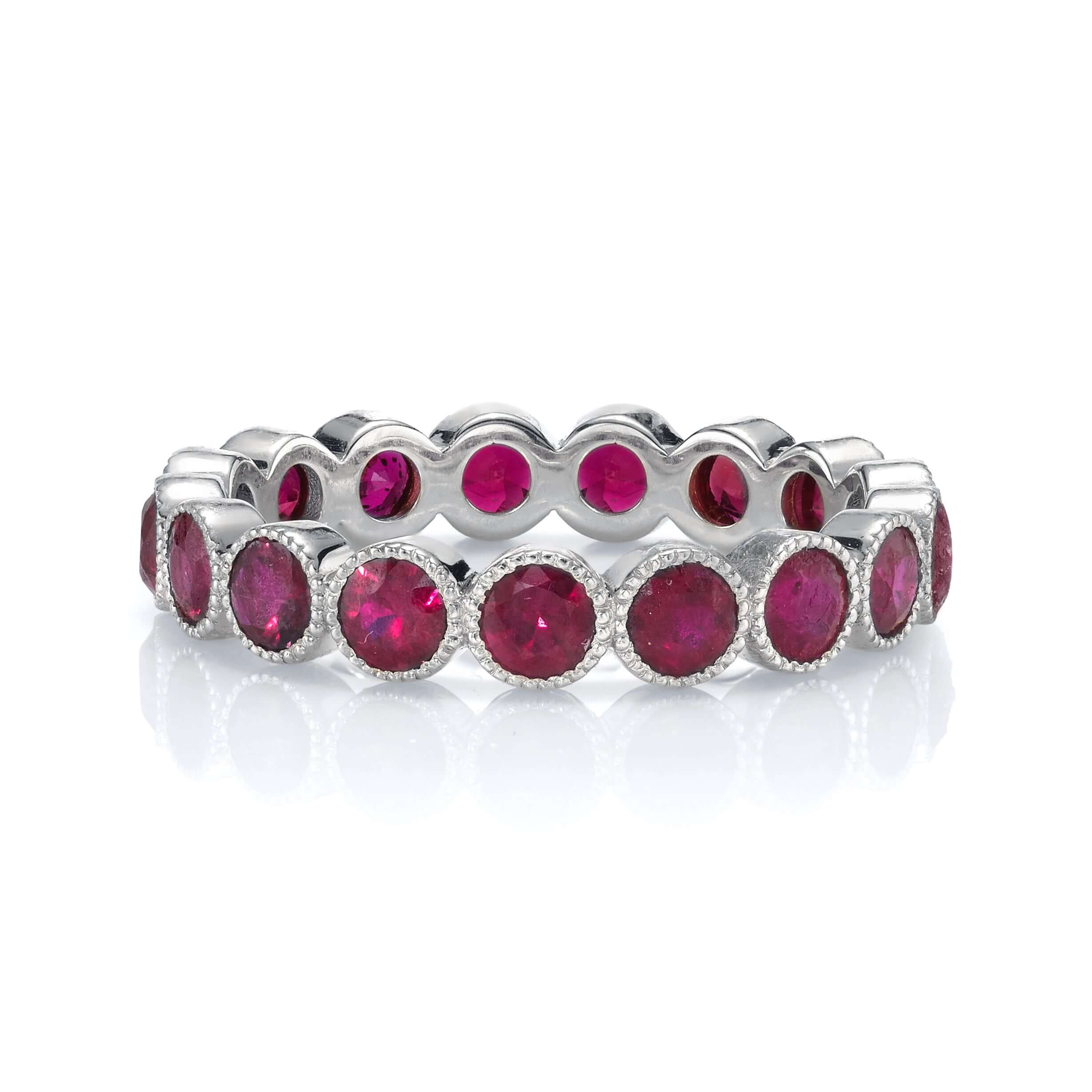 SINGLE STONE MEDIUM GABBY WITH GEMSTONES BAND | Approximately 2.30ctw round cut gemstones bezel set in a handcrafted eternity band. Approximate band with 3.6mm. Please inquire for additional customization.