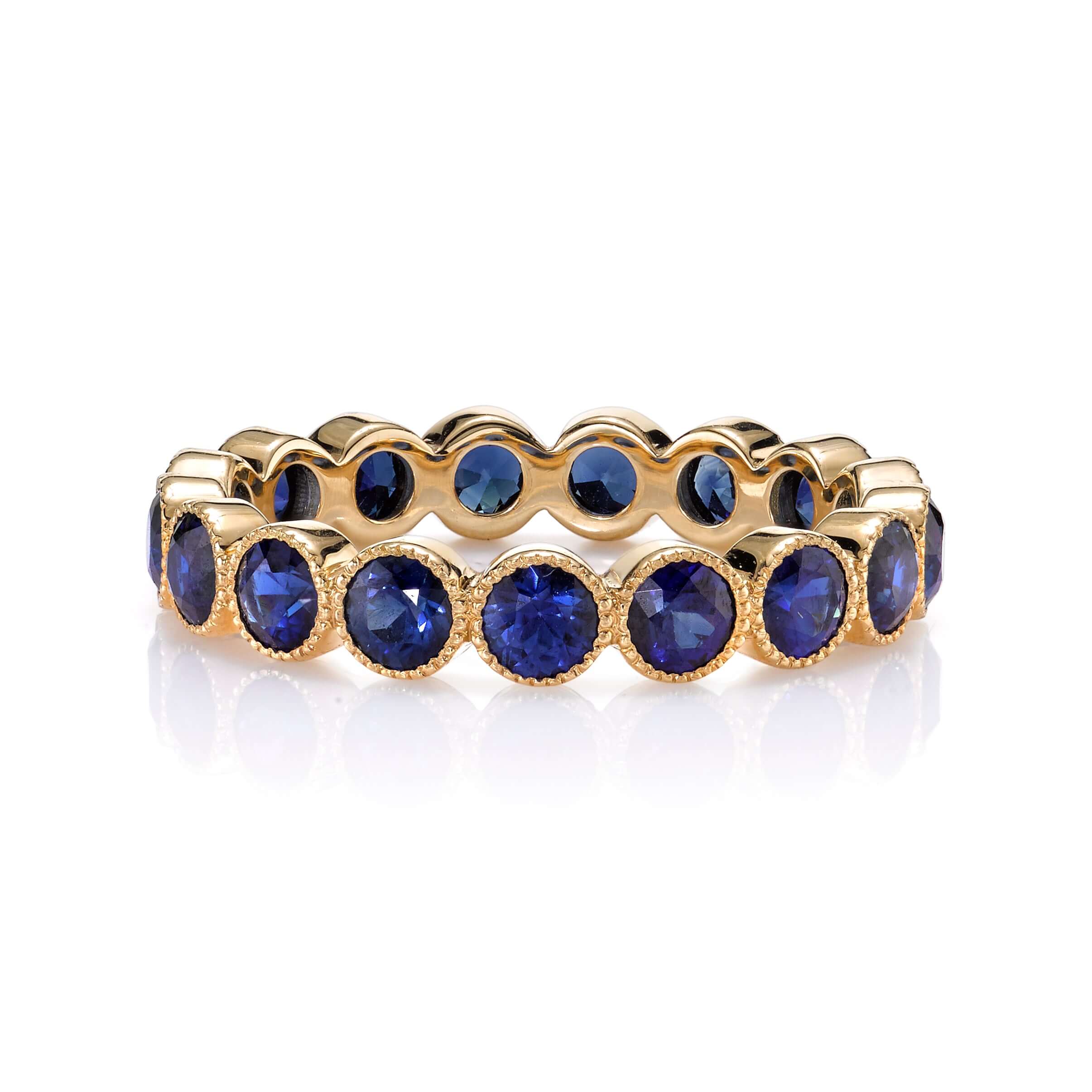 SINGLE STONE MEDIUM GABBY WITH GEMSTONES BAND | Approximately 2.30ctw round cut gemstones bezel set in a handcrafted eternity band. Approximate band with 3.6mm. Please inquire for additional customization.