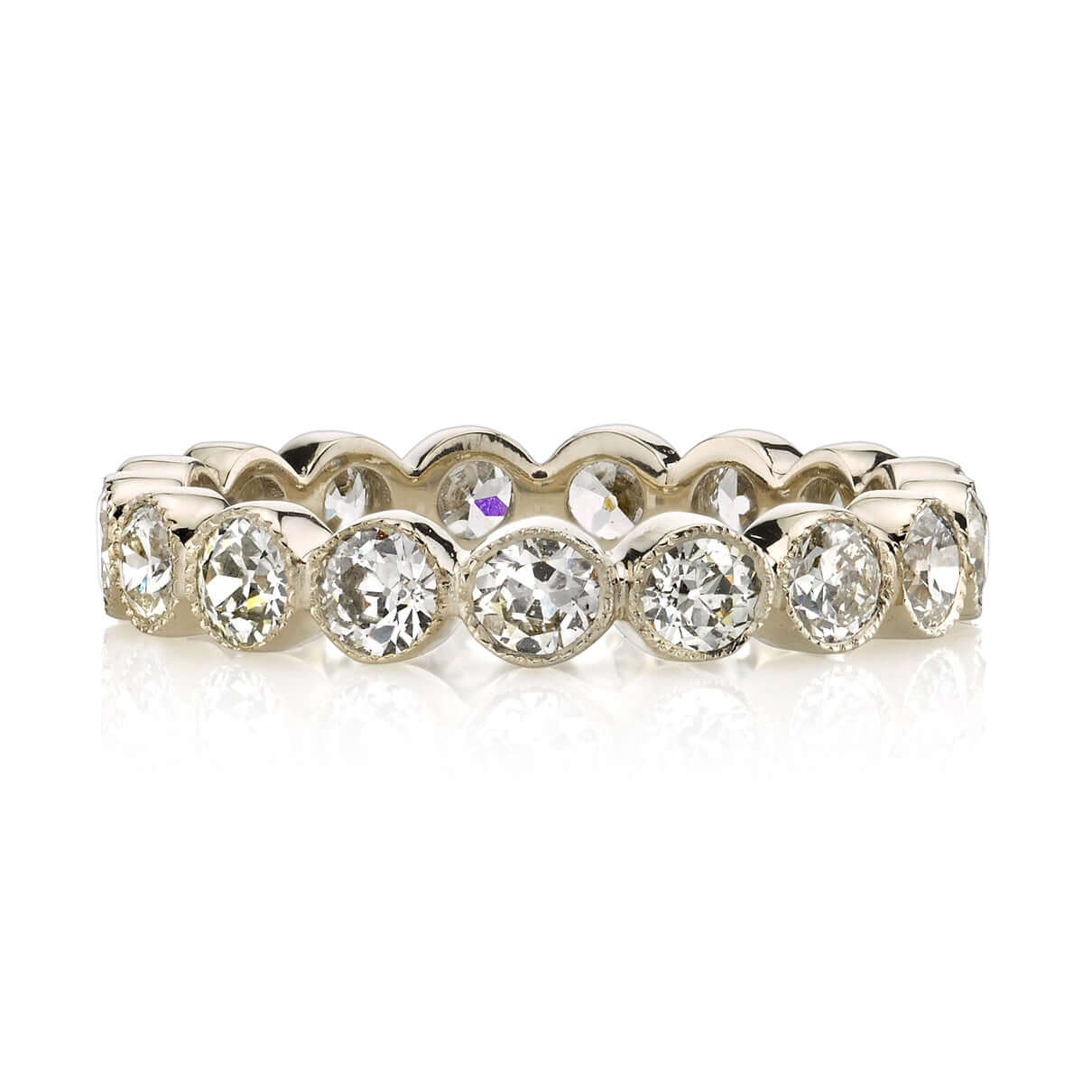 SINGLE STONE MEDIUM GABBY BAND | Approximately 1.75ctw old European cut diamonds set in a handcrafted bezel set eternity band. Approximate band with 3.6mm. Please inquire for additional customization.