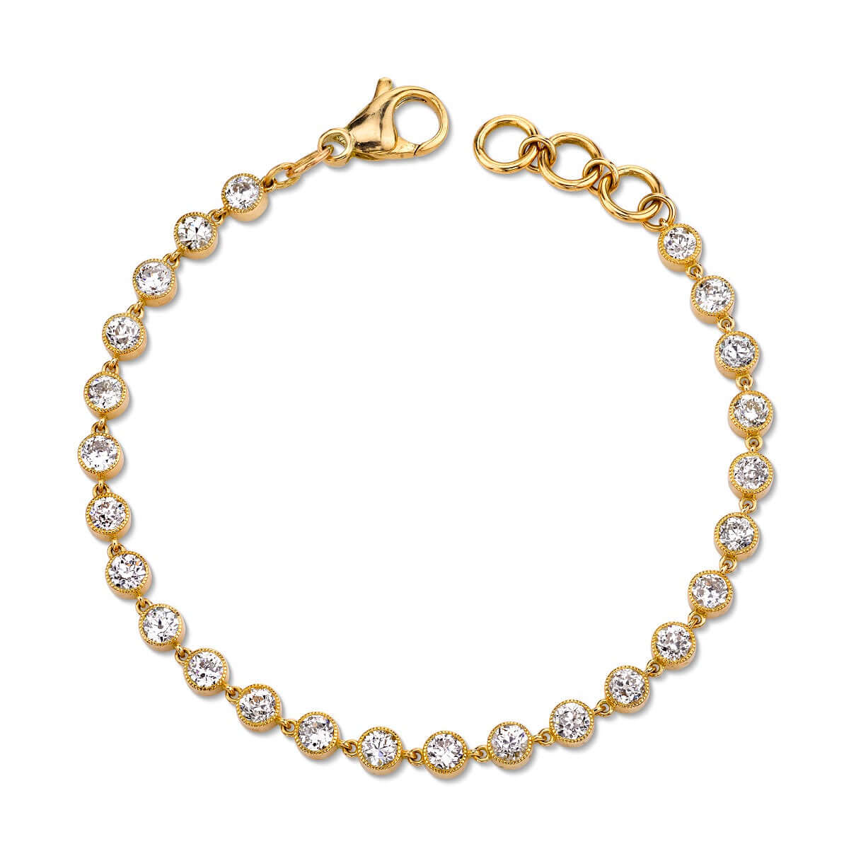 SINGLE STONE GABBY BRACELET featuring Approximately 5.30ctw G-H/VS-SI old European cut diamonds set in a handcrafted 18K yellow gold diamond tennis bracelet. Bracelet measures 7.5".
