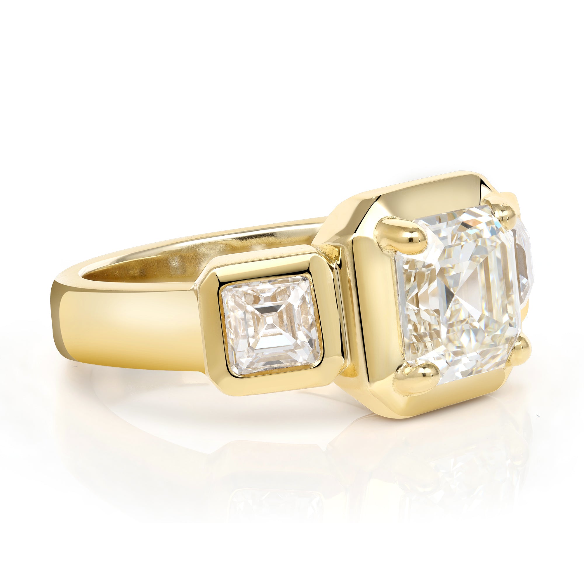 SINGLE STONE GLORIA RING featuring 2.14ct K/VVS2 GIA certified Asscher diamond with 0.97ctw Asscher cut accent diamonds set in a handcrafted 18K yellow gold mounting.
