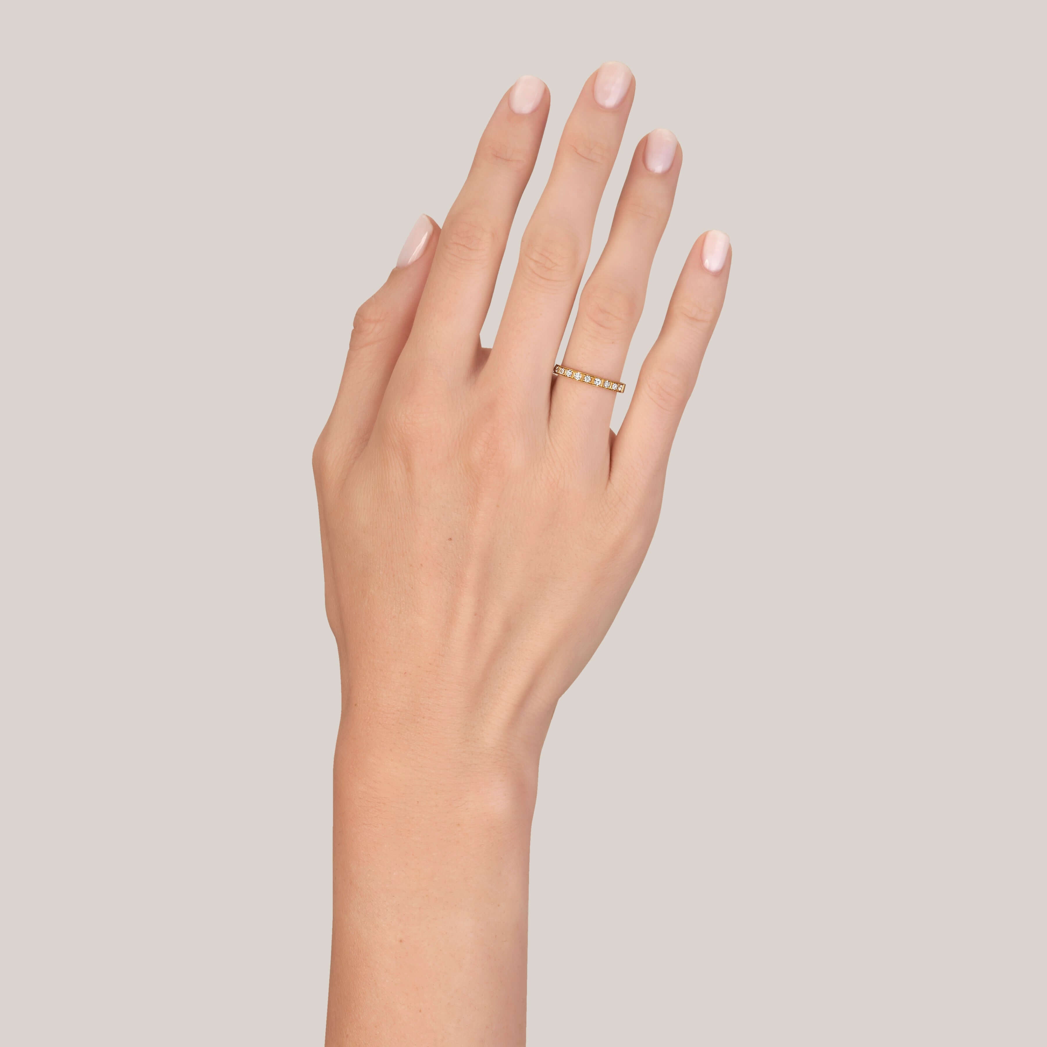 SINGLE STONE HADLEY BAND | Approximately 0.20ctw G-H/VS old European cut diamonds prong set in a handcrafted half eternity band. Approximate band width 2.3mm. Please inquire for additional customization.