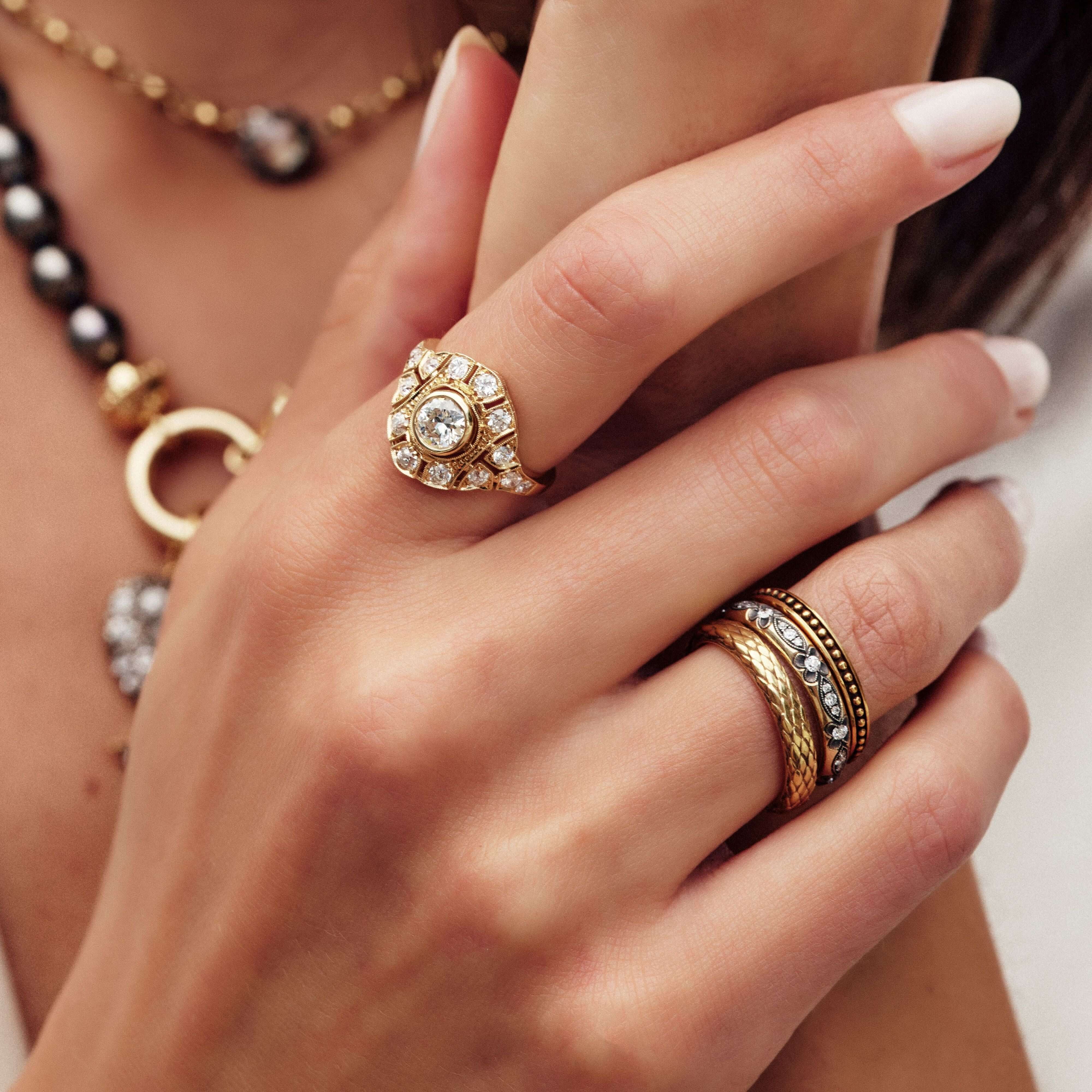 SINGLE STONE MAKAYLA BAND | Approximately 0.30ctw G-H/VS old European cut diamonds set in a handcrafted oxidized 18K yellow gold and silver eternity band. Approximate band width 3.4mm. Please inquire for additional customization.