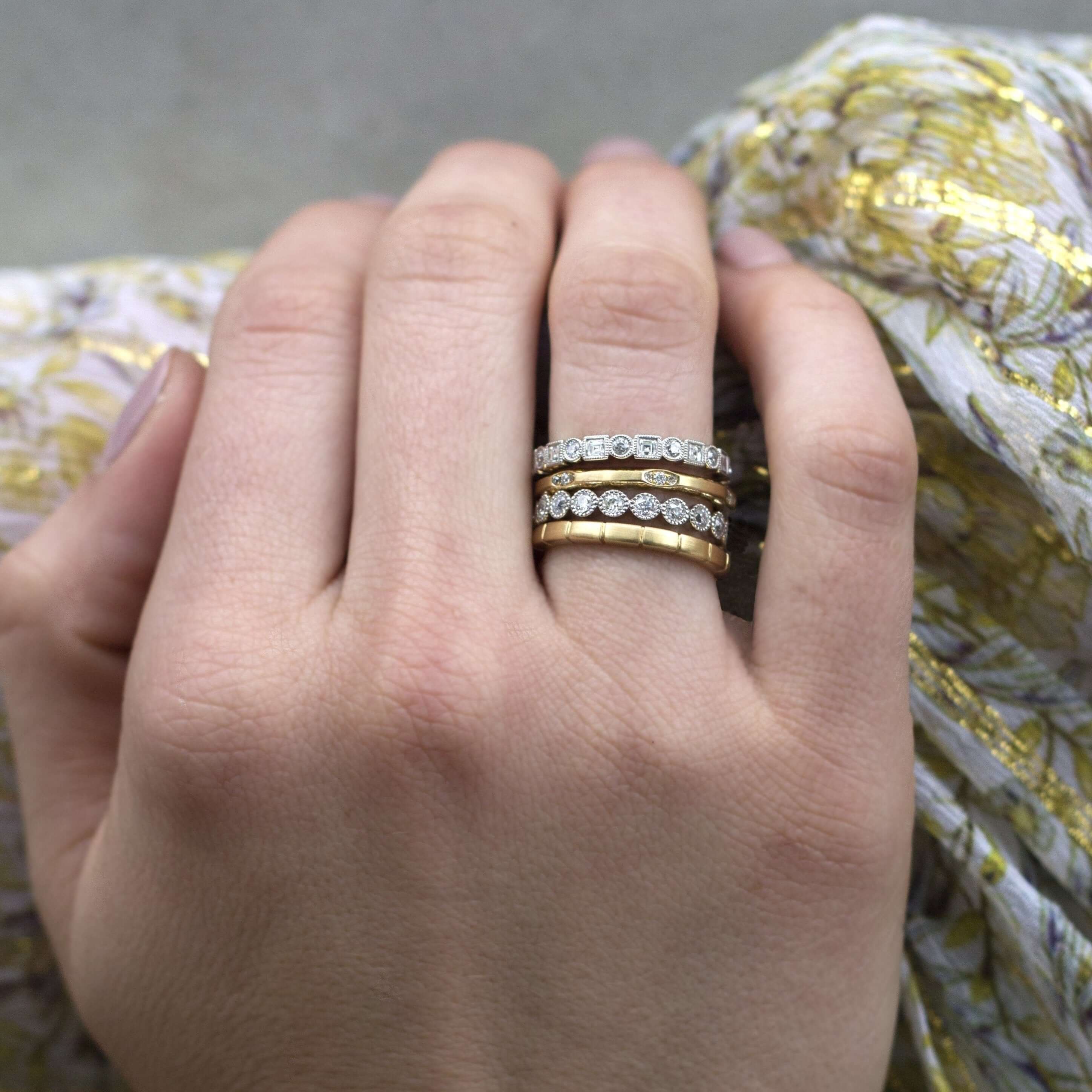 SINGLE STONE GROVER BAND | Approximately 0.15ctw G-H/VS old European cut diamonds set in a handcrafted satin finish eternity band. Approximate band width 2mm. Please inquire for additional customization.