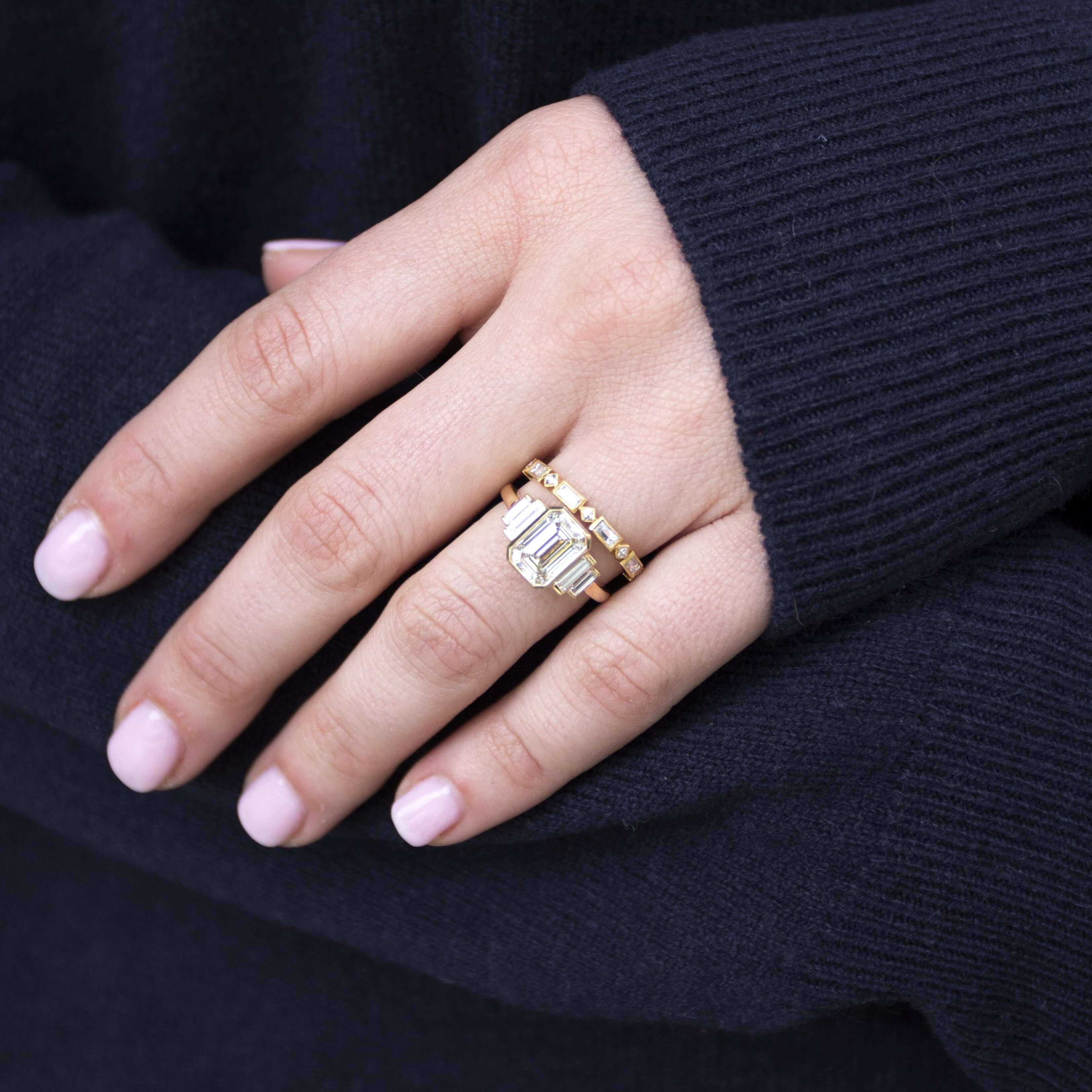 SINGLE STONE MADELINE BAND | Approximately 0.80-1.00ctw square and rectangular French cut diamonds bezel set in a handcrafted eternity band. Approximate band width 2.4mm. *Stone weight may vary from piece to piece. Please inquire for additional customizat