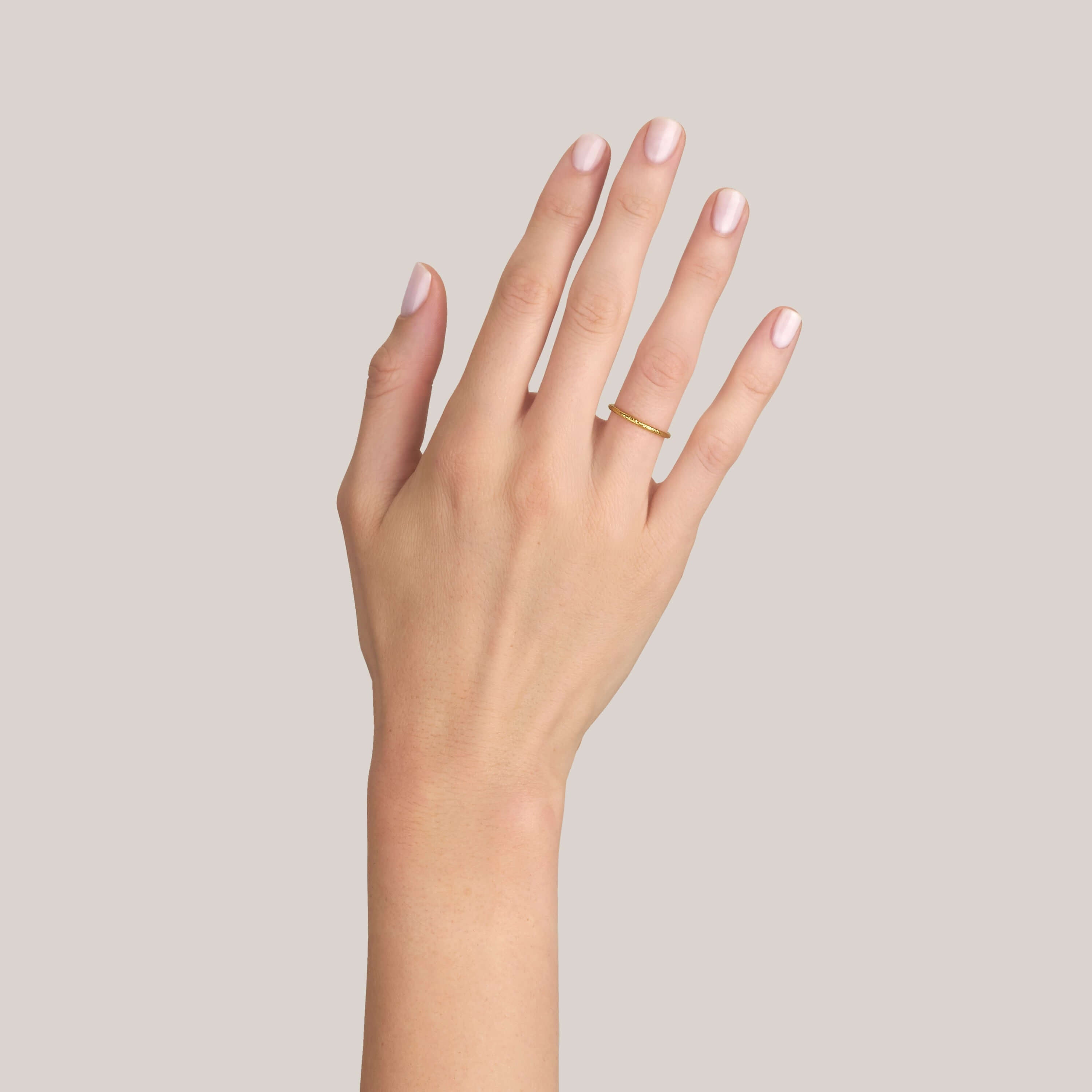 SINGLE STONE SMALL JANE BAND | 1.5mm handcrafted hammer finished gold band. Please inquire for additional customization.