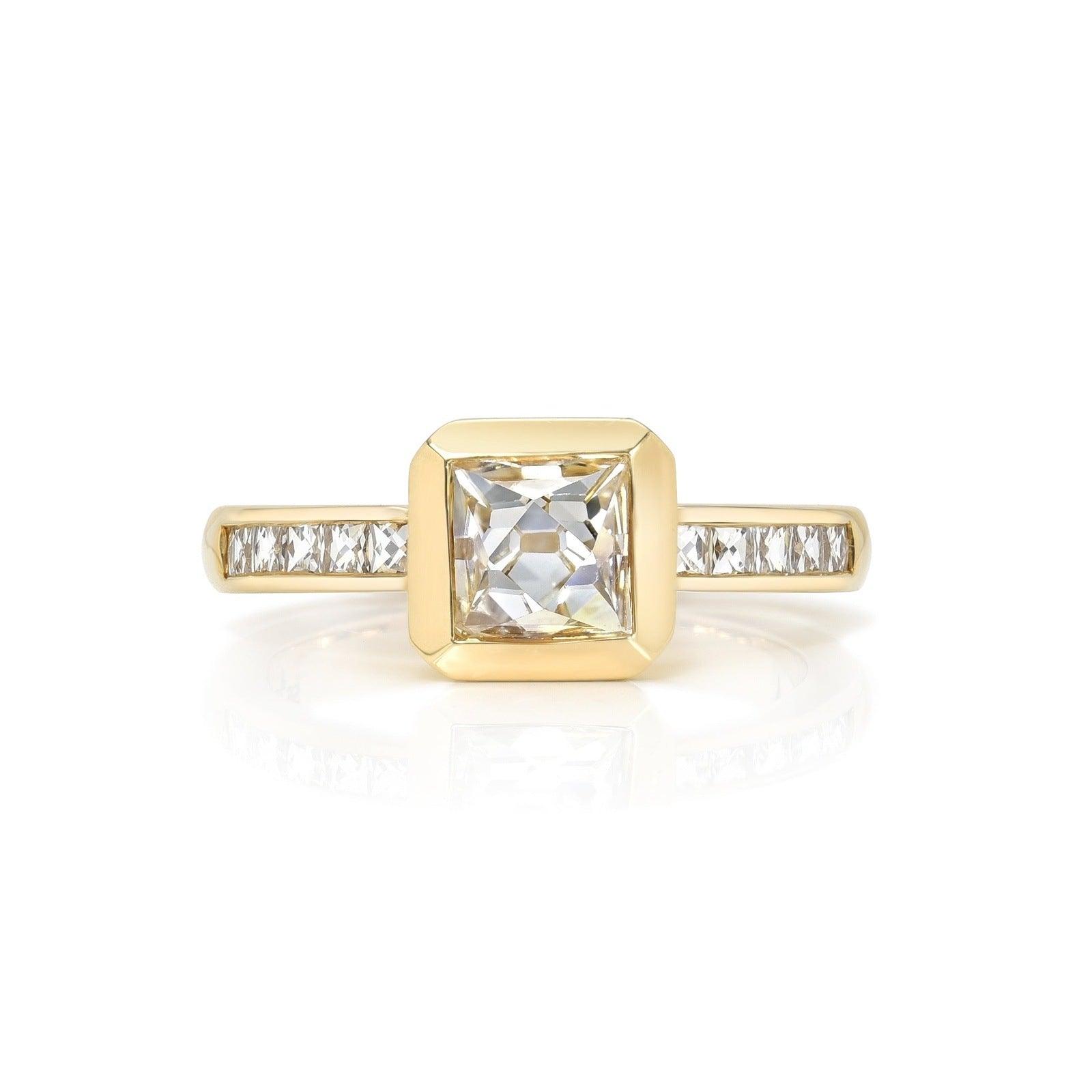 SINGLE STONE KARINA RING featuring 1.24ct G/I1 GIA certified French cut diamond with 0.40ctw French cut accent diamonds set in a handcrafted 18K yellow gold mounting.