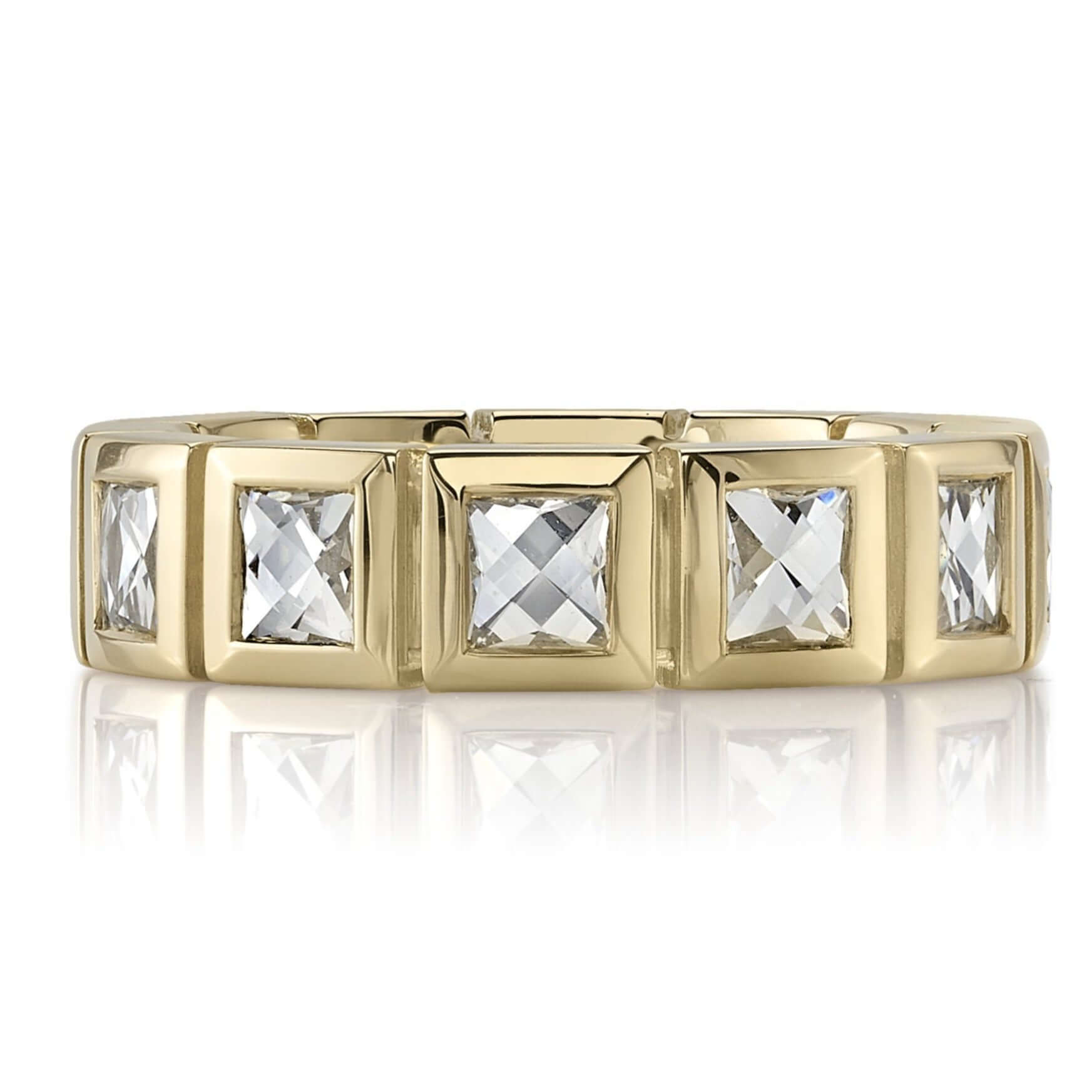 SINGLE STONE LARGE KARINA BAND | Approximately 2.50ctw G-H/VS French cut diamonds bezel set in a handcrafted eternity band. Approximate band width 5.5mm. Please inquire for additional customization.