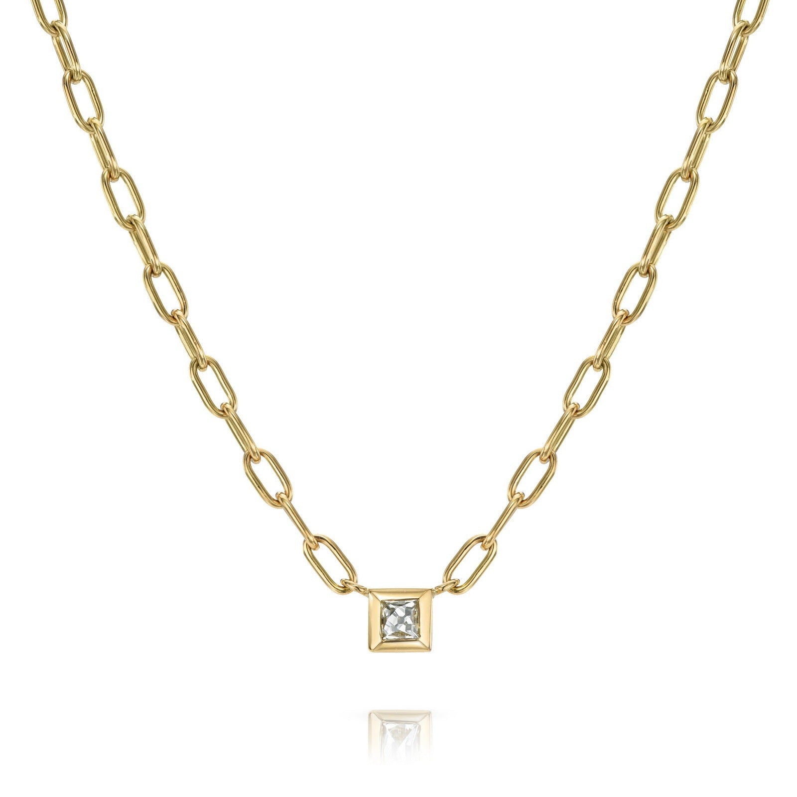 Single Stone KARINA NECKLACE featuring 0.35ct J-K/VS French cut diamond bezel set on a handcrafted 18K yellow gold pendant necklace. Necklace measures 17"