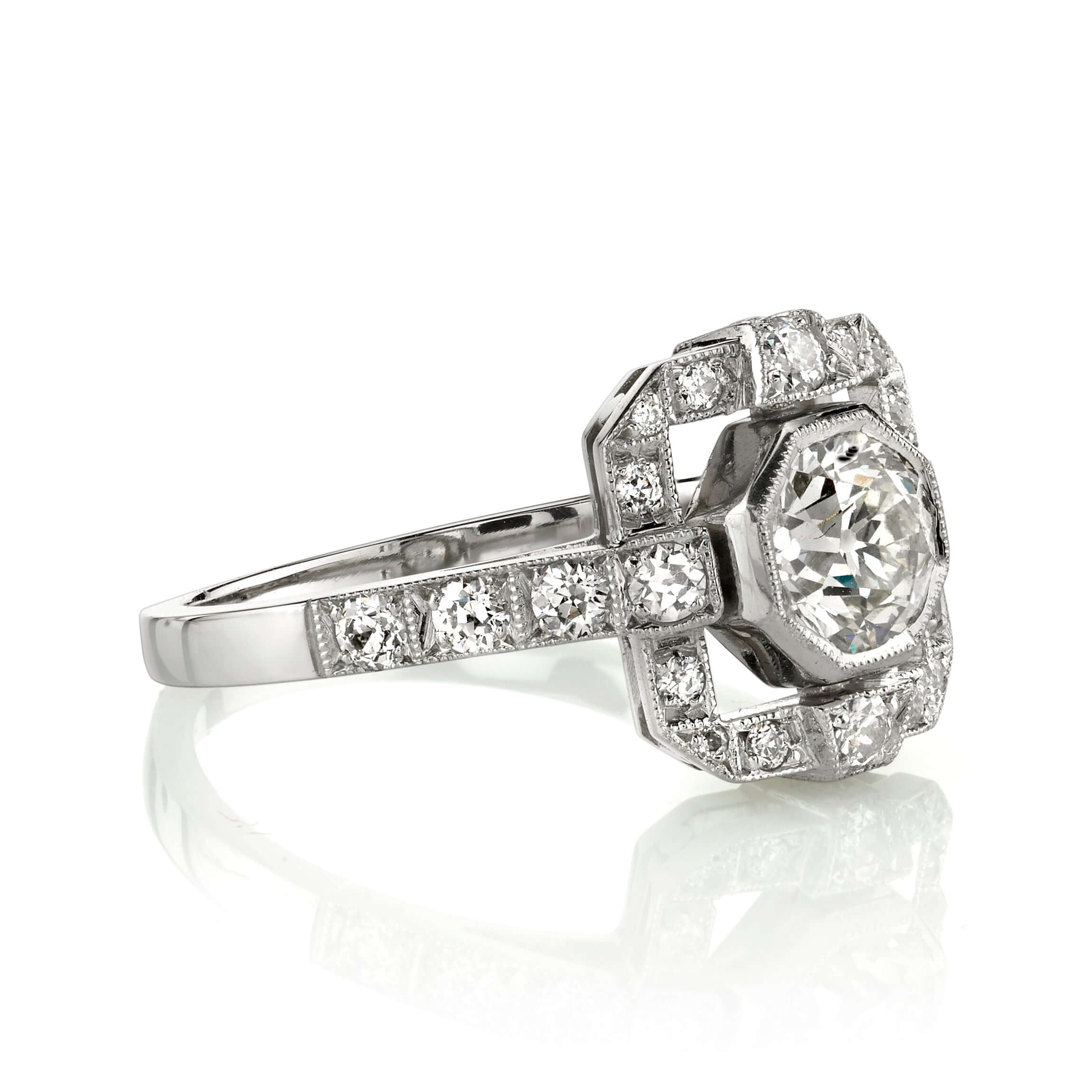 SINGLE STONE KATIE RING featuring 0.69ct K/VS2 GIA certified old European cut diamond with 0.35ctw old European cut accent diamonds set in a handcrafted platinum mounting.