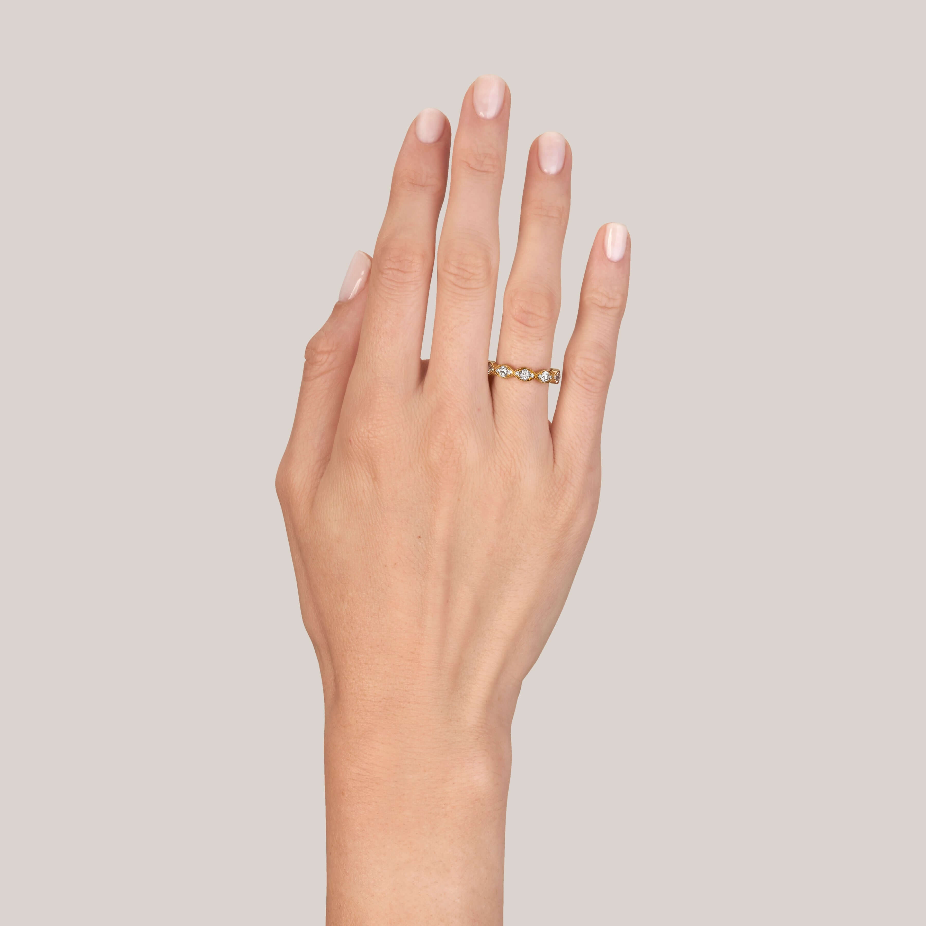 SINGLE STONE KELLY BAND | Approximately 1.40ctw old European cut diamonds set in a handcrafted marquise shaped eternity band. Approximate band width 4mm. Please inquire for additional customization.