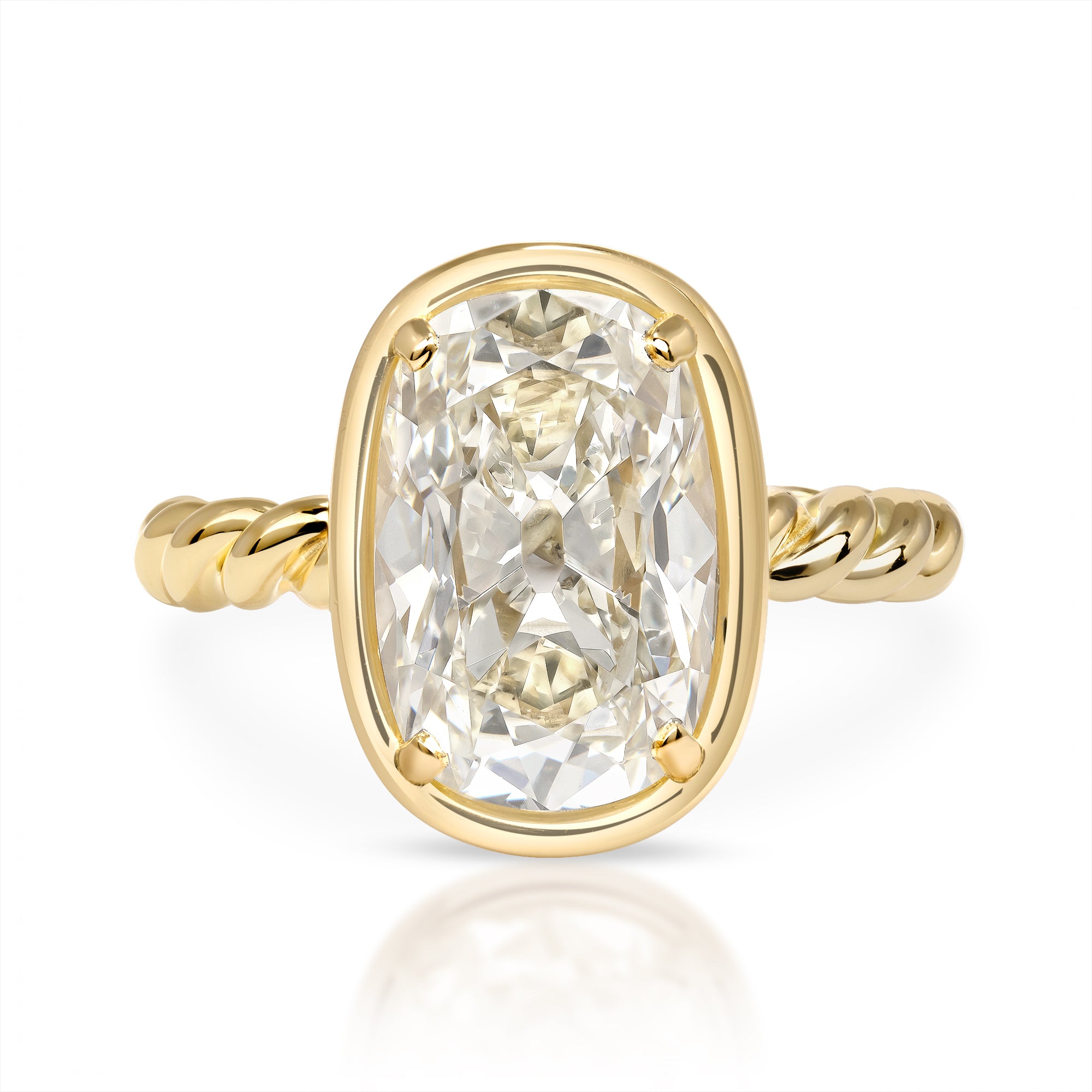 SINGLE STONE LARA RING featuring 5.09ct S-T/VS1 GIA certified antique Cushion cut diamond bezel set in a handcrafted 18K yellow gold mounting.