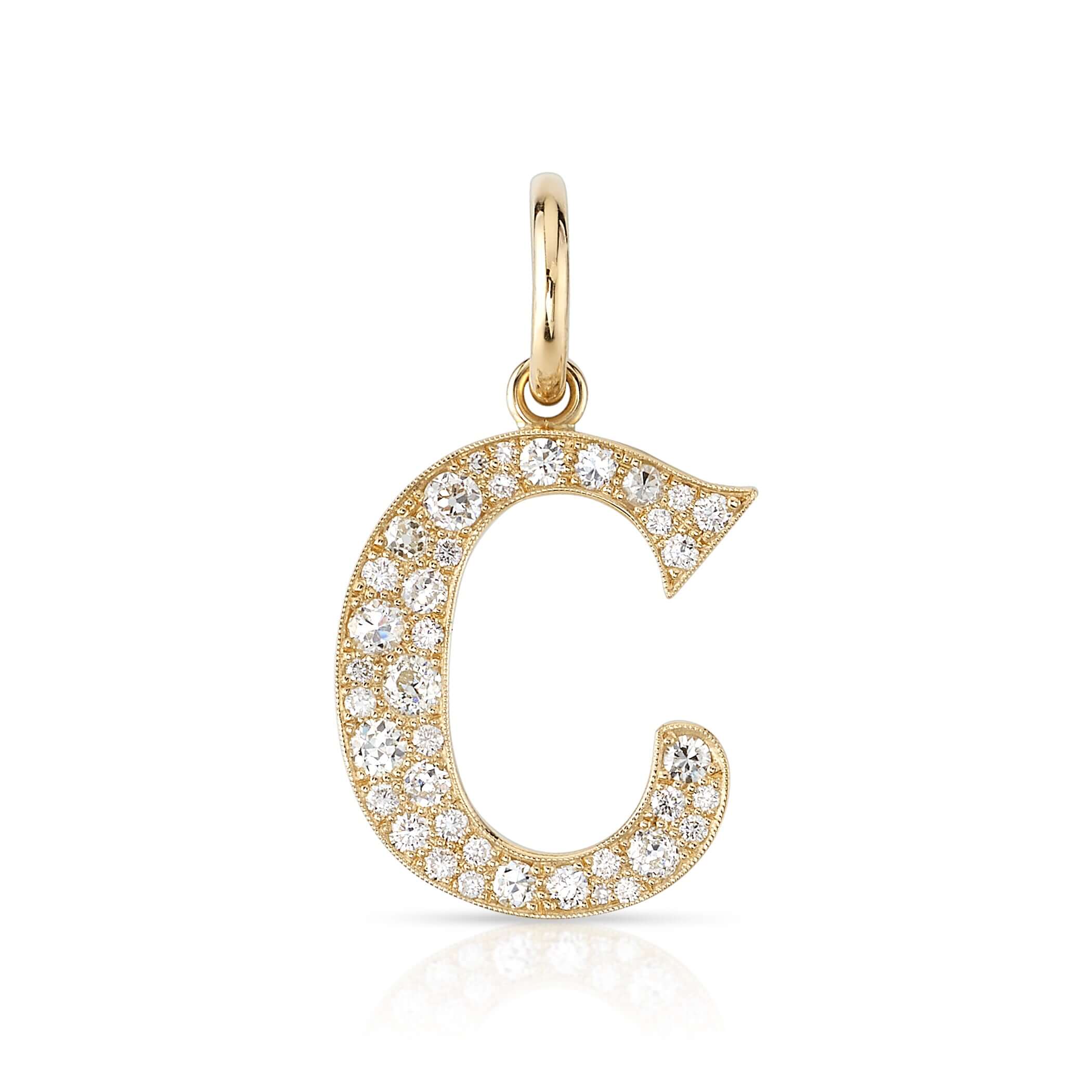 SINGLE STONE LARGE COBBLESTONE LETTERS PENDANT featuring Approximately 0.95ctw-2.75ctw varying old cut and round brilliant cut diamonds set in a handcrafted 18K yellow gold letter pendant. Letters are approximately 1" tall. Available in an oxidized or pol