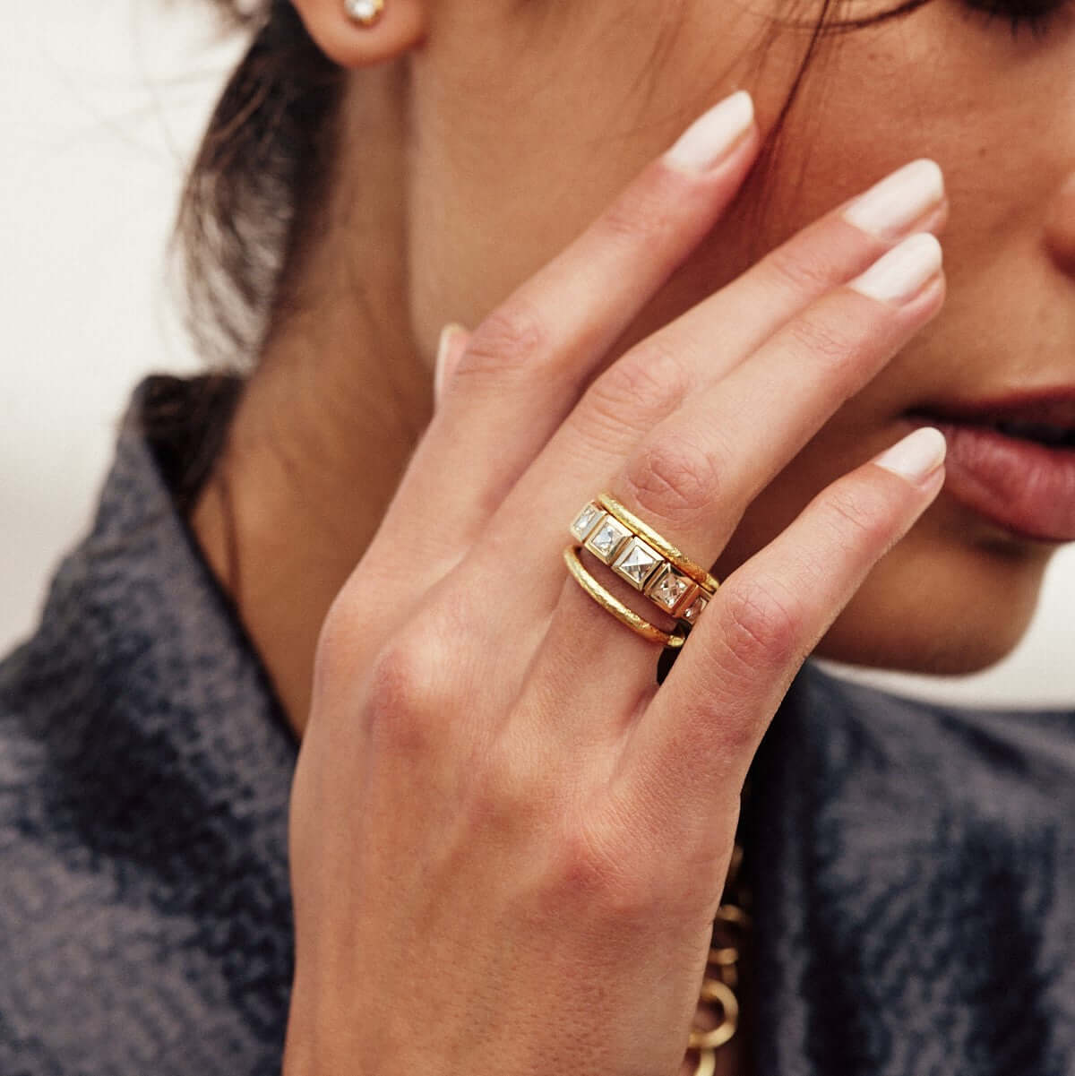 SINGLE STONE LARGE KARINA BAND | Approximately 2.50ctw G-H/VS French cut diamonds bezel set in a handcrafted eternity band. Approximate band width 5.5mm. Please inquire for additional customization.