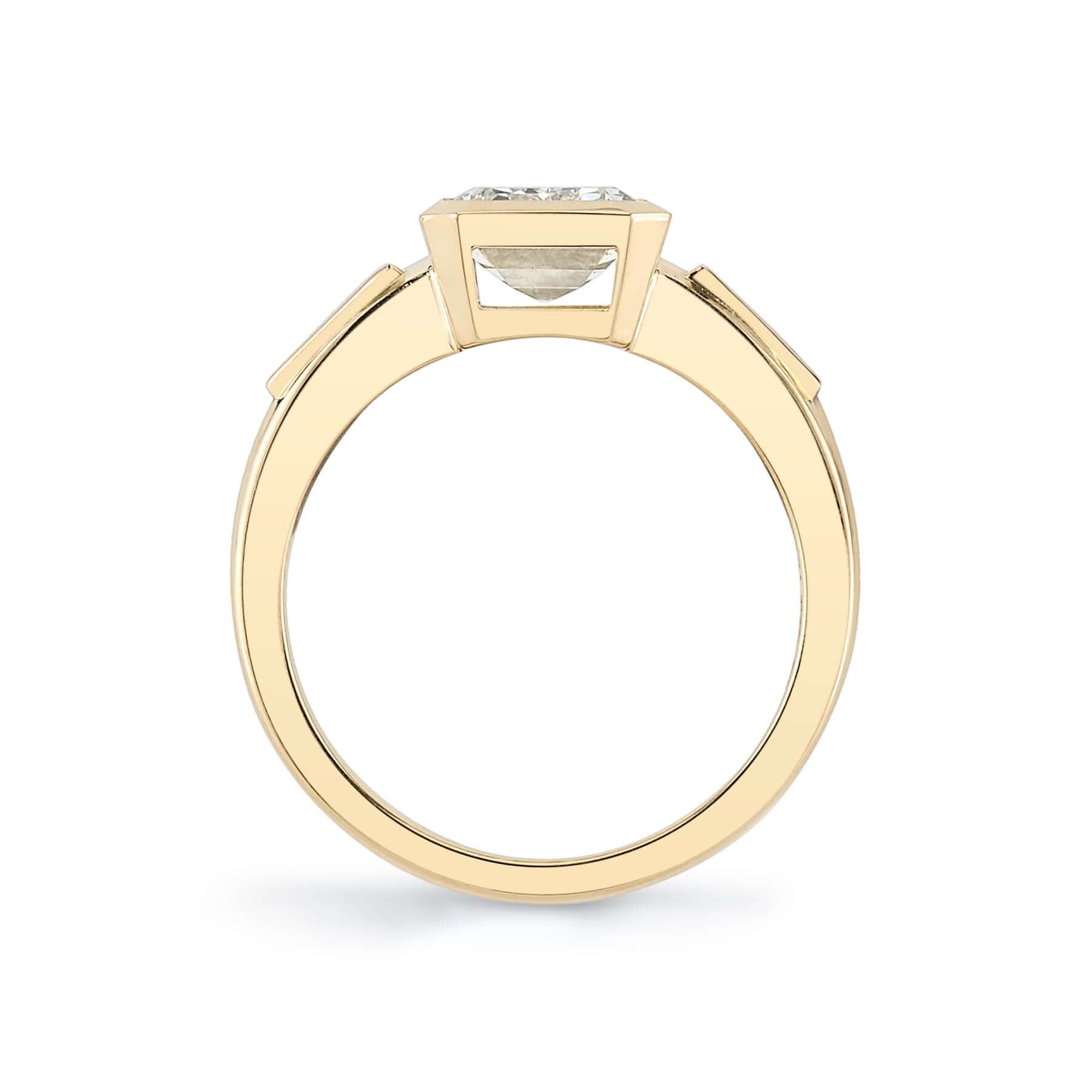 SINGLE STONE LAURIE RING featuring 2.00ct N/VS2 GIA certified emerald cut diamond with 0.24ctw baguette cut accent diamonds bezel set in a handcrafted 18K yellow gold mounting.