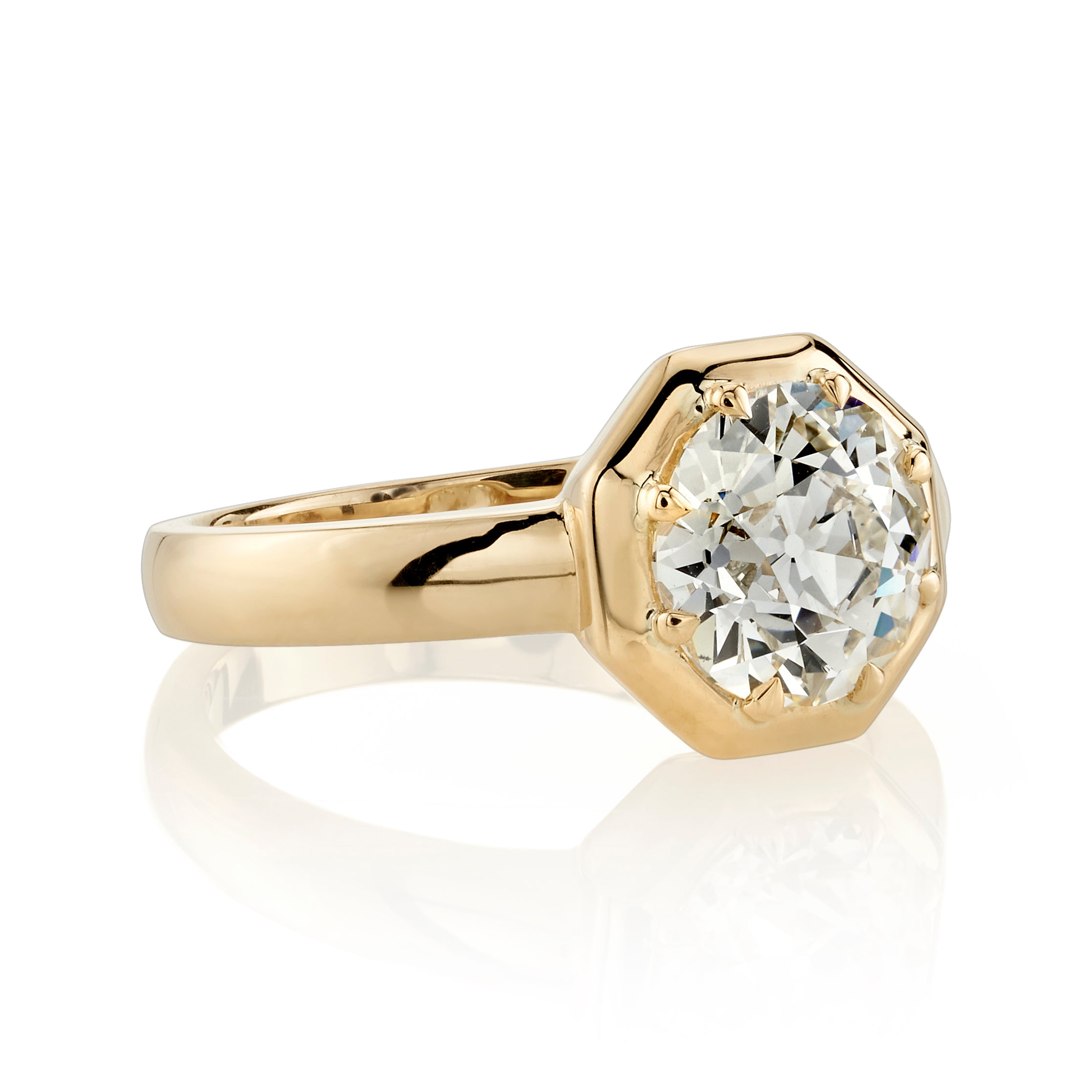 SINGLE STONE LOLA RING featuring 1.99ct O-P/VS1 GIA certified old European cut diamond prong set in a handcrafted 18K yellow gold mounting.