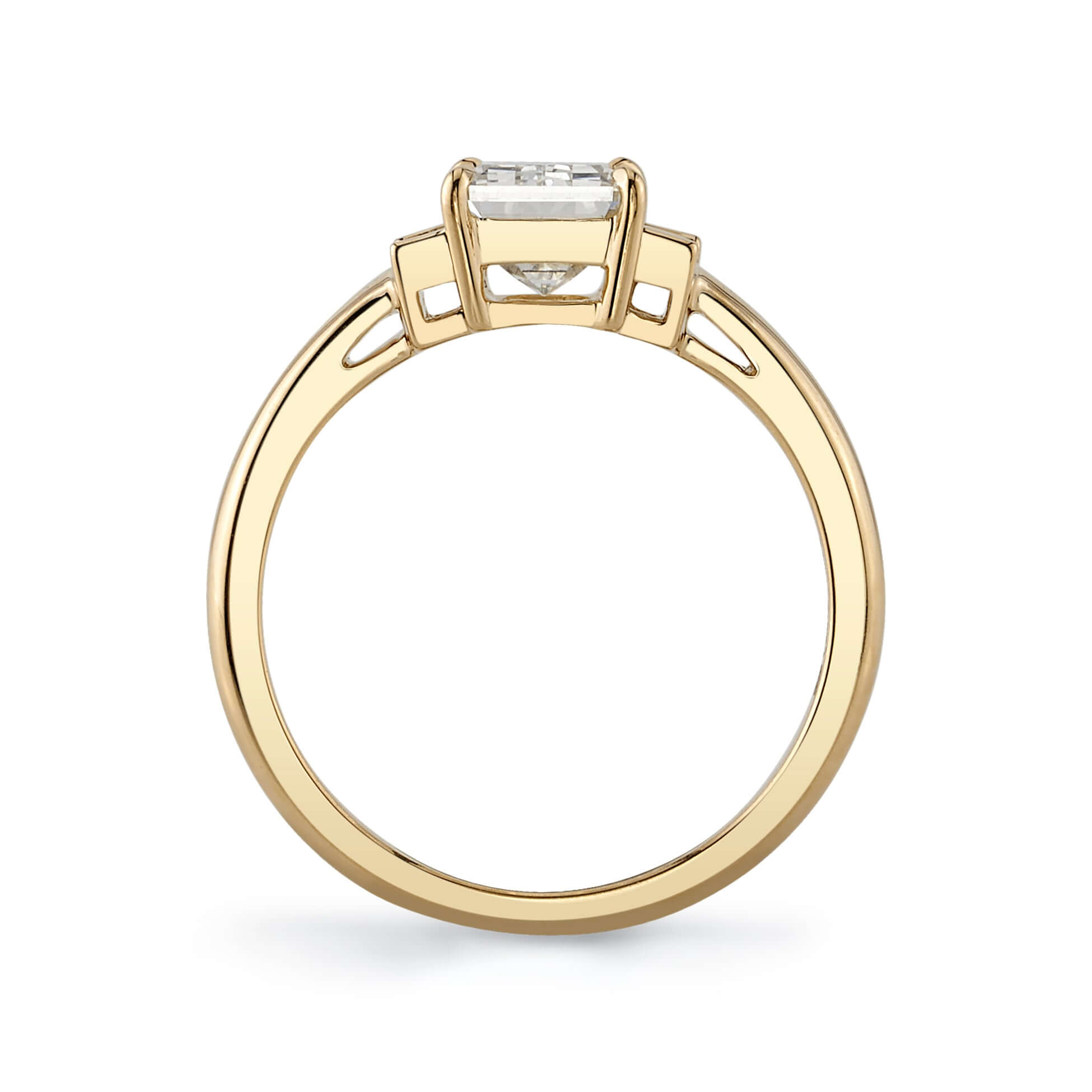 SINGLE STONE LONDON RING featuring 1.72ct M/VVS1 GIA certified emerald cut diamond with 0.25ctw baguette cut accent diamonds set in a handcrafted 18K yellow gold mounting.