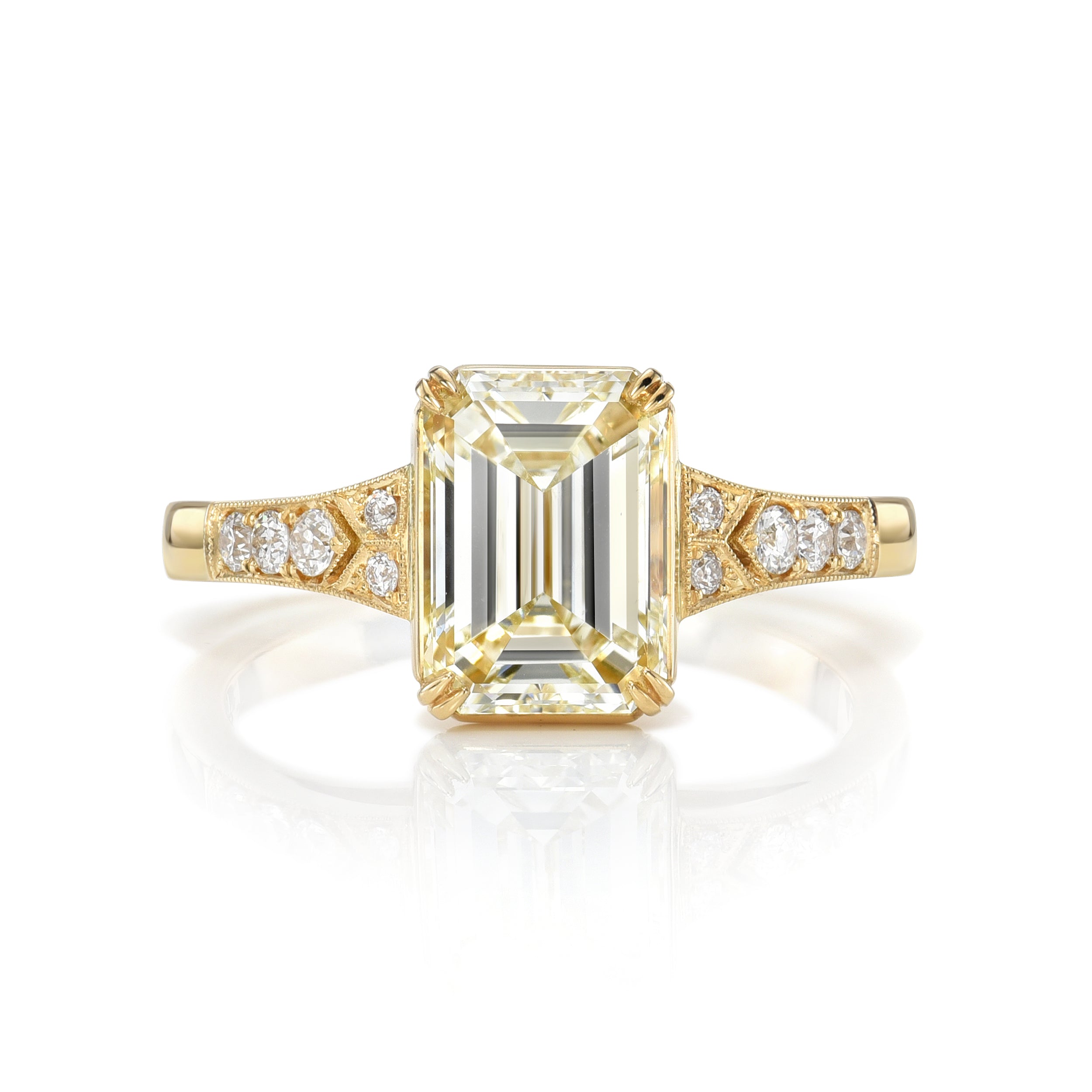SINGLE STONE LORRAINE RING featuring 2.00ct M/VS2 GIA certified emerald cut diamond with 0.10ctw old European cut accent diamonds set in a handcrafted 18K yellow gold mounting.