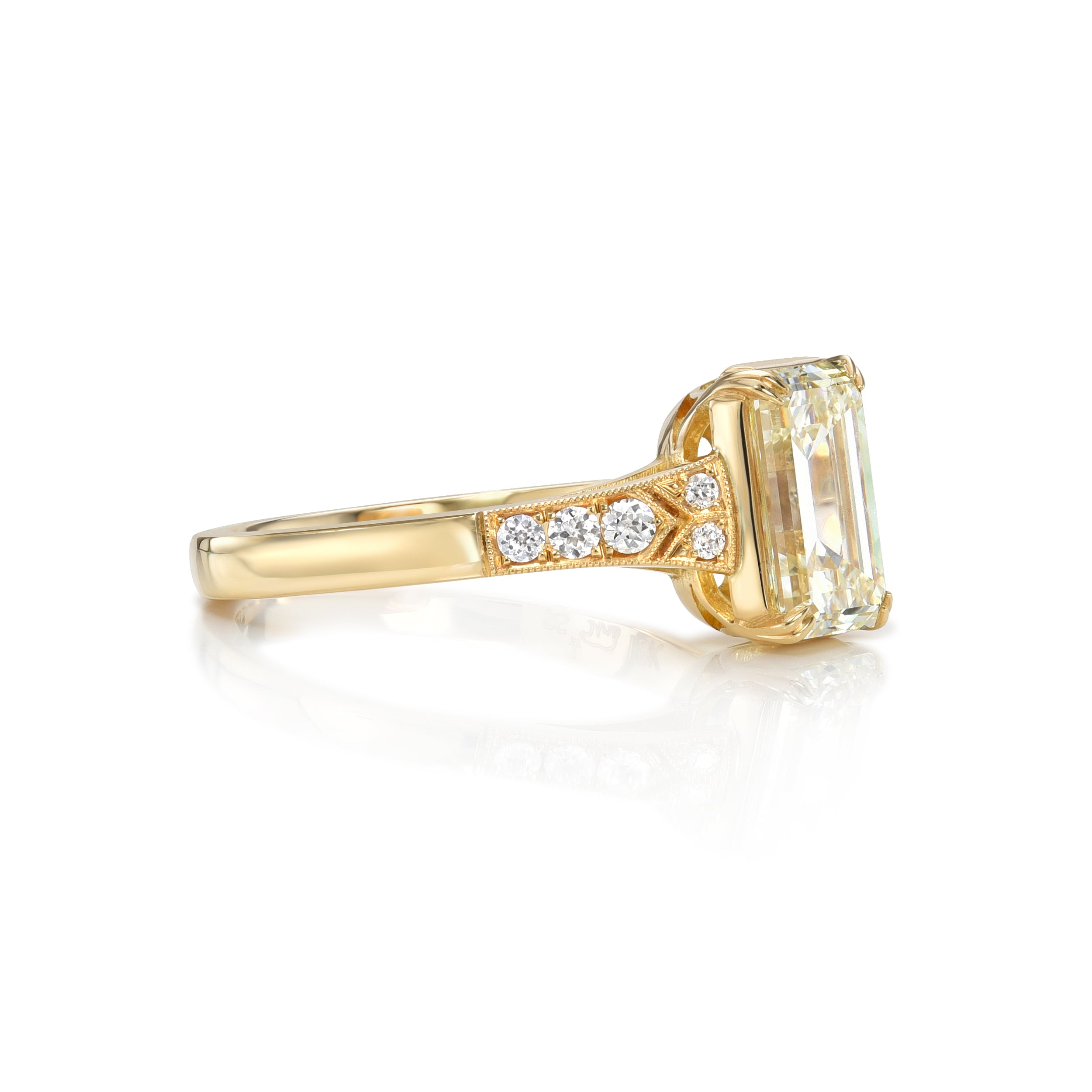 SINGLE STONE LORRAINE RING featuring 2.00ct M/VS2 GIA certified emerald cut diamond with 0.10ctw old European cut accent diamonds set in a handcrafted 18K yellow gold mounting.