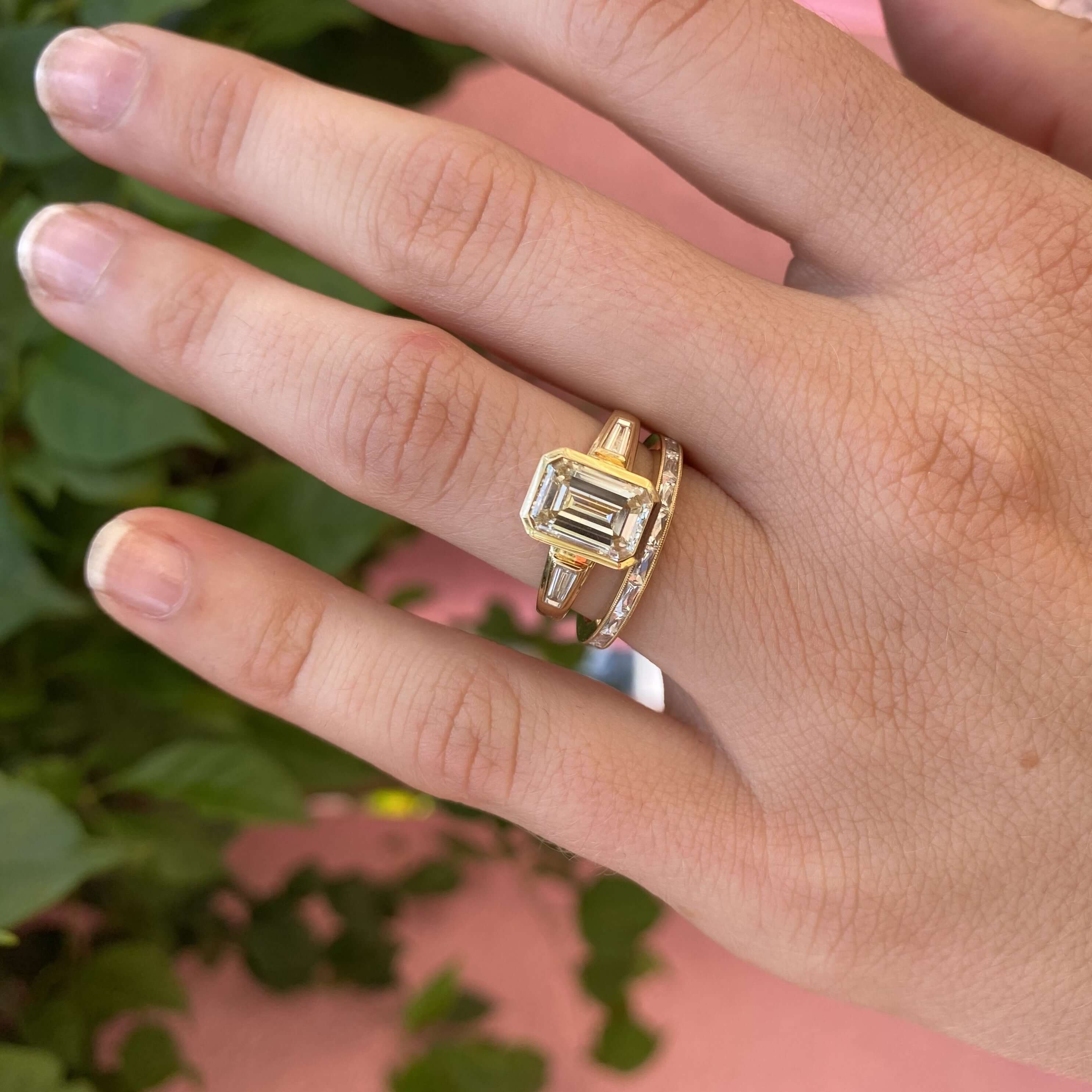 SINGLE STONE EMMA BAND | Approximately 0.90ctw G-H/VS French cut diamonds channel set in a handcrafted eternity band. Approximate band width 2mm. Please inquire for additional customization.