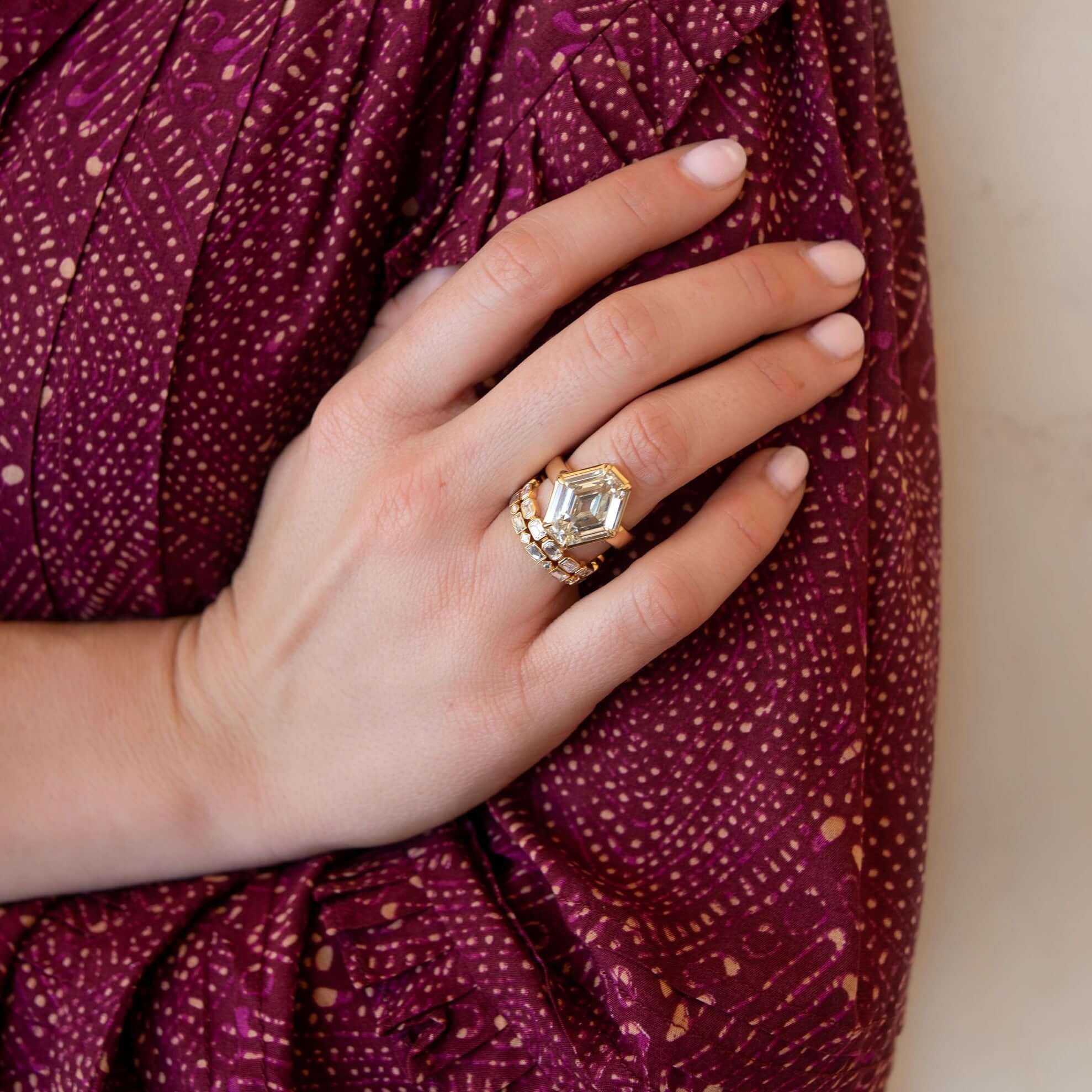 SINGLE STONE MADELINE BAND | Approximately 0.80-1.00ctw square and rectangular French cut diamonds bezel set in a handcrafted eternity band. Approximate band width 2.4mm. *Stone weight may vary from piece to piece. Please inquire for additional customizat