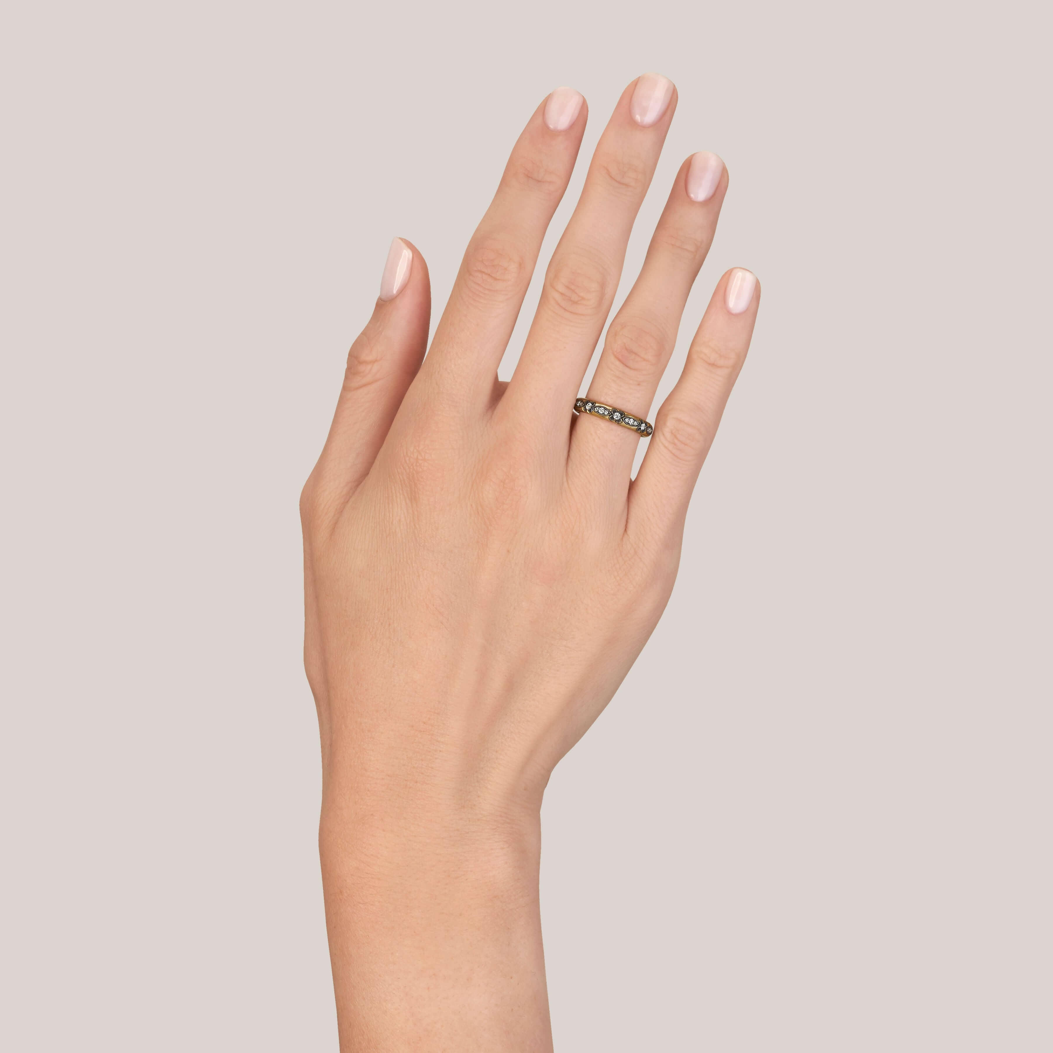 SINGLE STONE MAKAYLA BAND | Approximately 0.30ctw G-H/VS old European cut diamonds set in a handcrafted oxidized 18K yellow gold and silver eternity band. Approximate band width 3.4mm. Please inquire for additional customization.