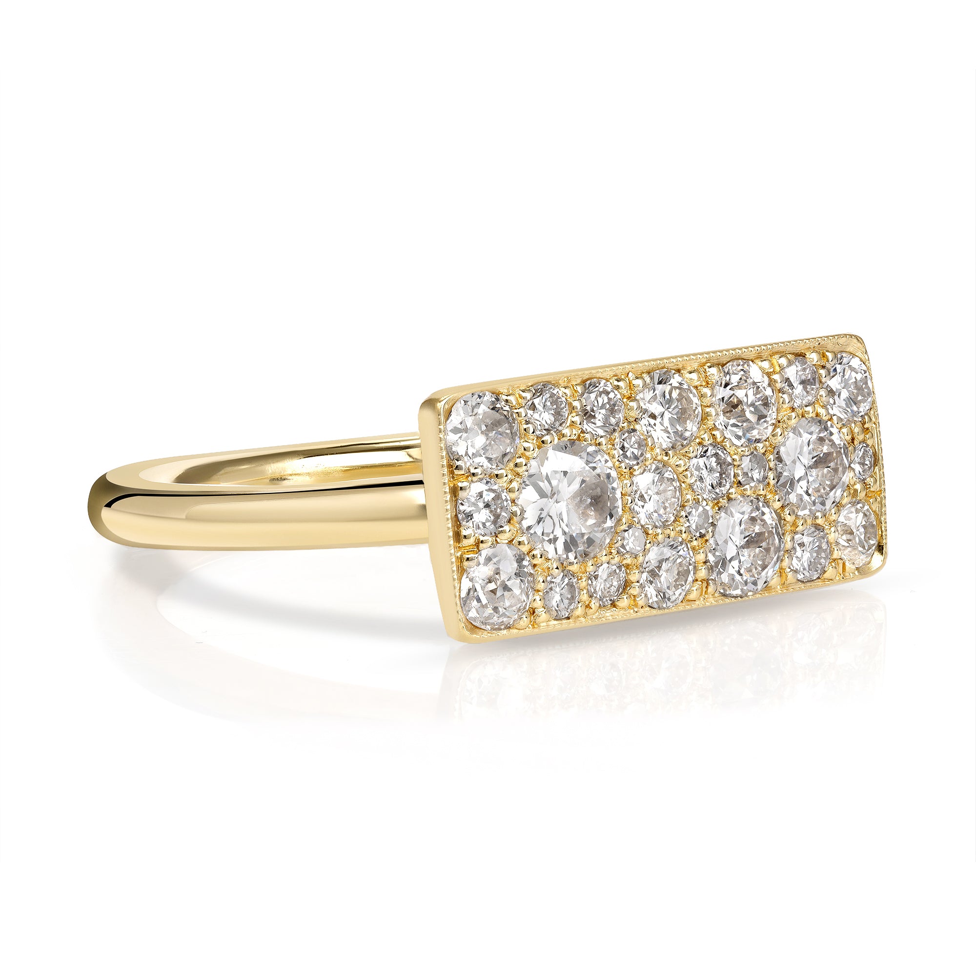 SINGLE STONE MILO COBBLESTONE RING RING featuring 0.95ctw various old cut and round brilliant cut diamonds set in a handcrafted 18K yellow gold mounting. Price may vary according to total diamond weight. *Cobblestone pattern may vary from piece to piece