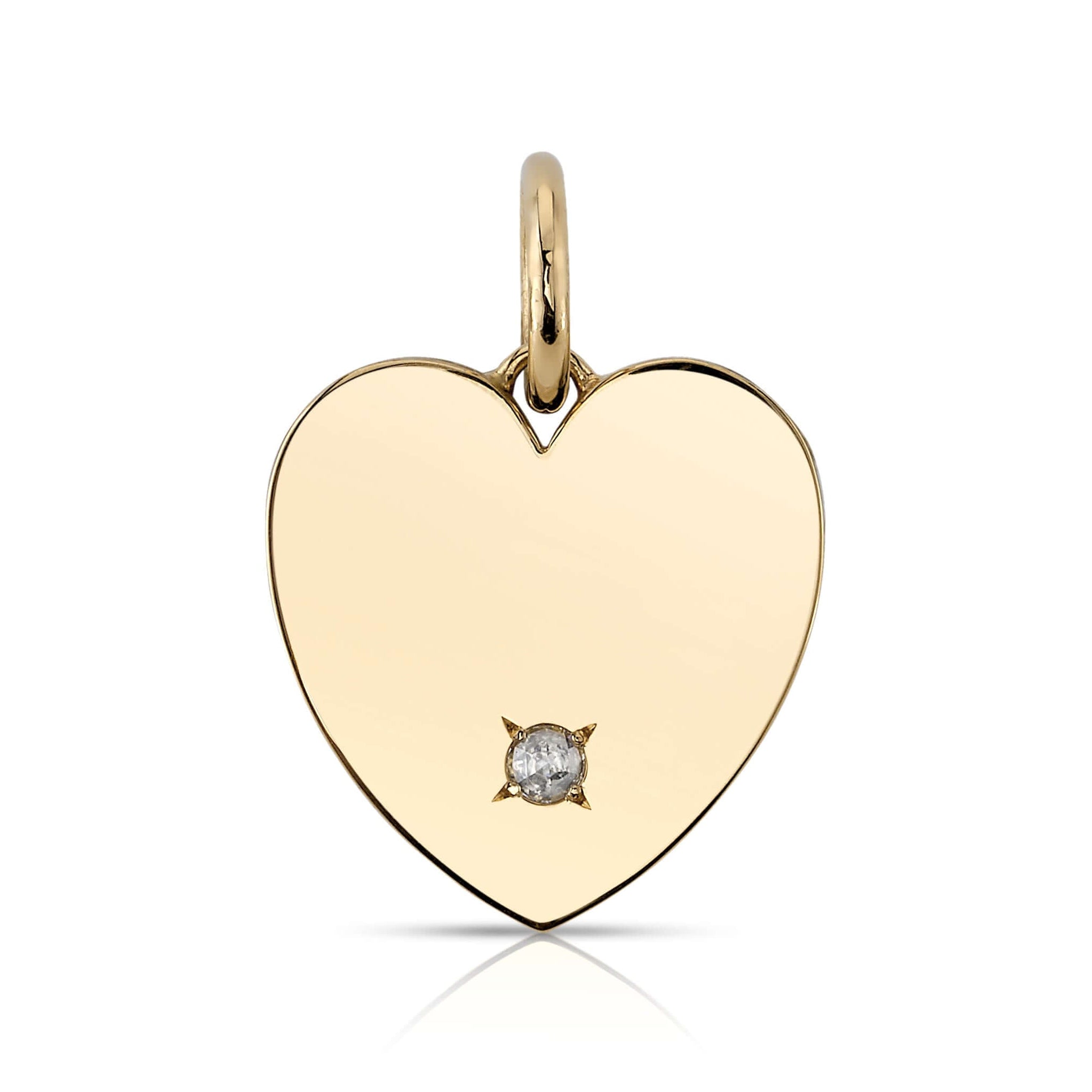 SINGLE STONE MINNIE WITH DIAMOND PENDANT featuring 0.08ctw H/SI rose cut diamond set in a handcrafted 18K yellow gold engravable heart shaped pendant. Charm measures 22mm x 21mm. Available in a polished or matte finish. Price does not include chain.