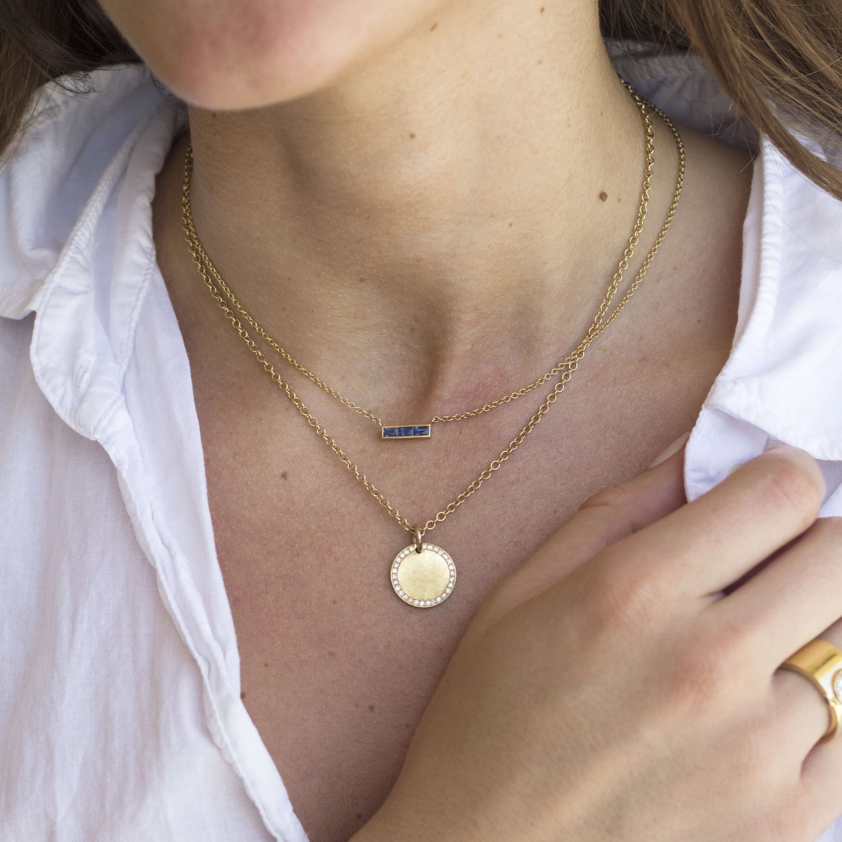 SINGLE STONE MONET NECKLACE WITH GEMSTONES featuring Approximately 0.50ctw French cut rubies or sapphires set in a handcrafted bar pendant. Necklace measures 17".