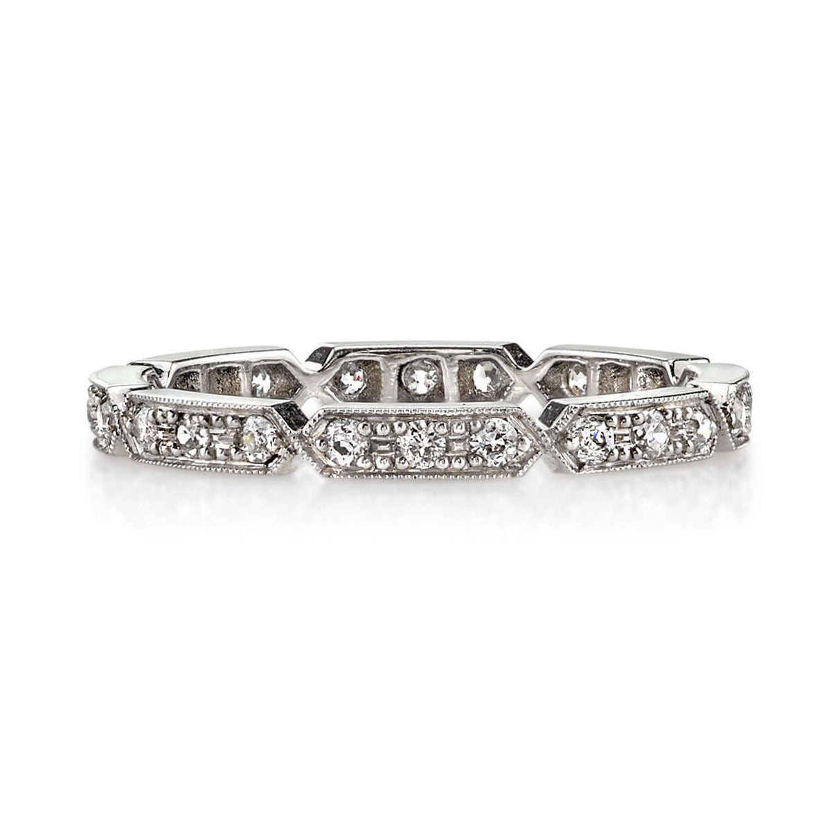 SINGLE STONE CARLY BAND | Approximately 0.30ctw G-H/VS old European cut diamonds prong set in a handcrafted geometric sectional eternity band. Approximate band width 2.1mm. Please inquire for additional customization.