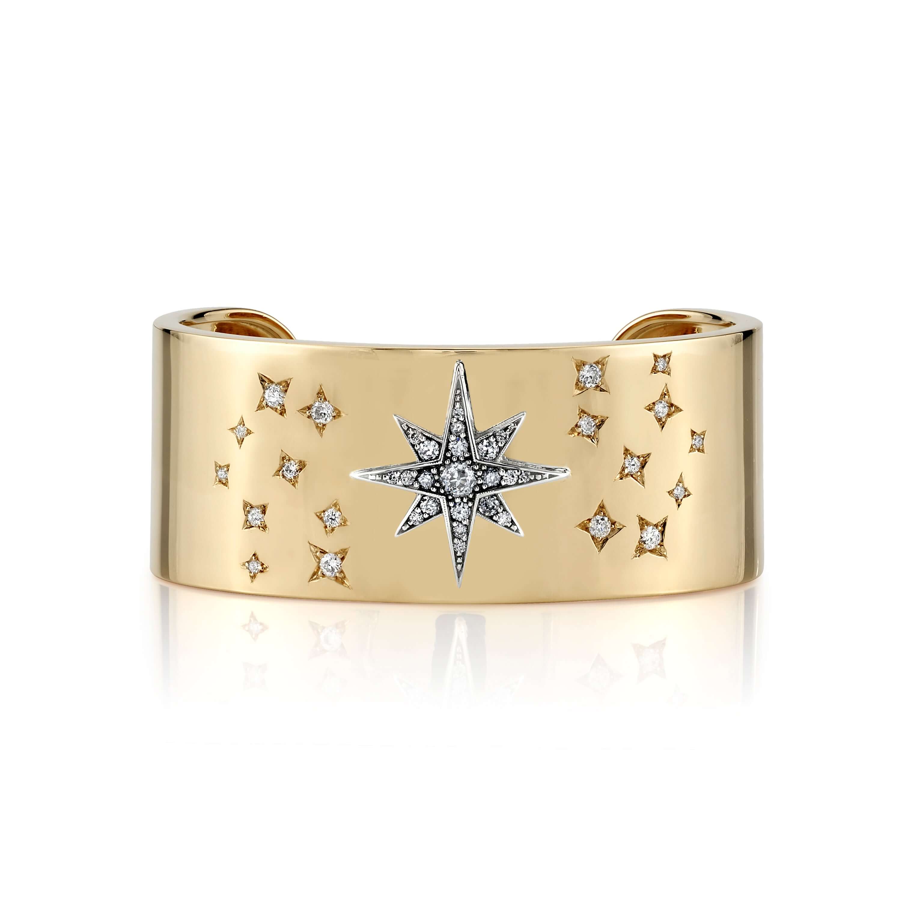 SINGLE STONE ASHLYN CUFF featuring 1.15ctw old European, antique cushion, and round brilliant cut diamonds set in a handcrafted 18K yellow gold cuff.