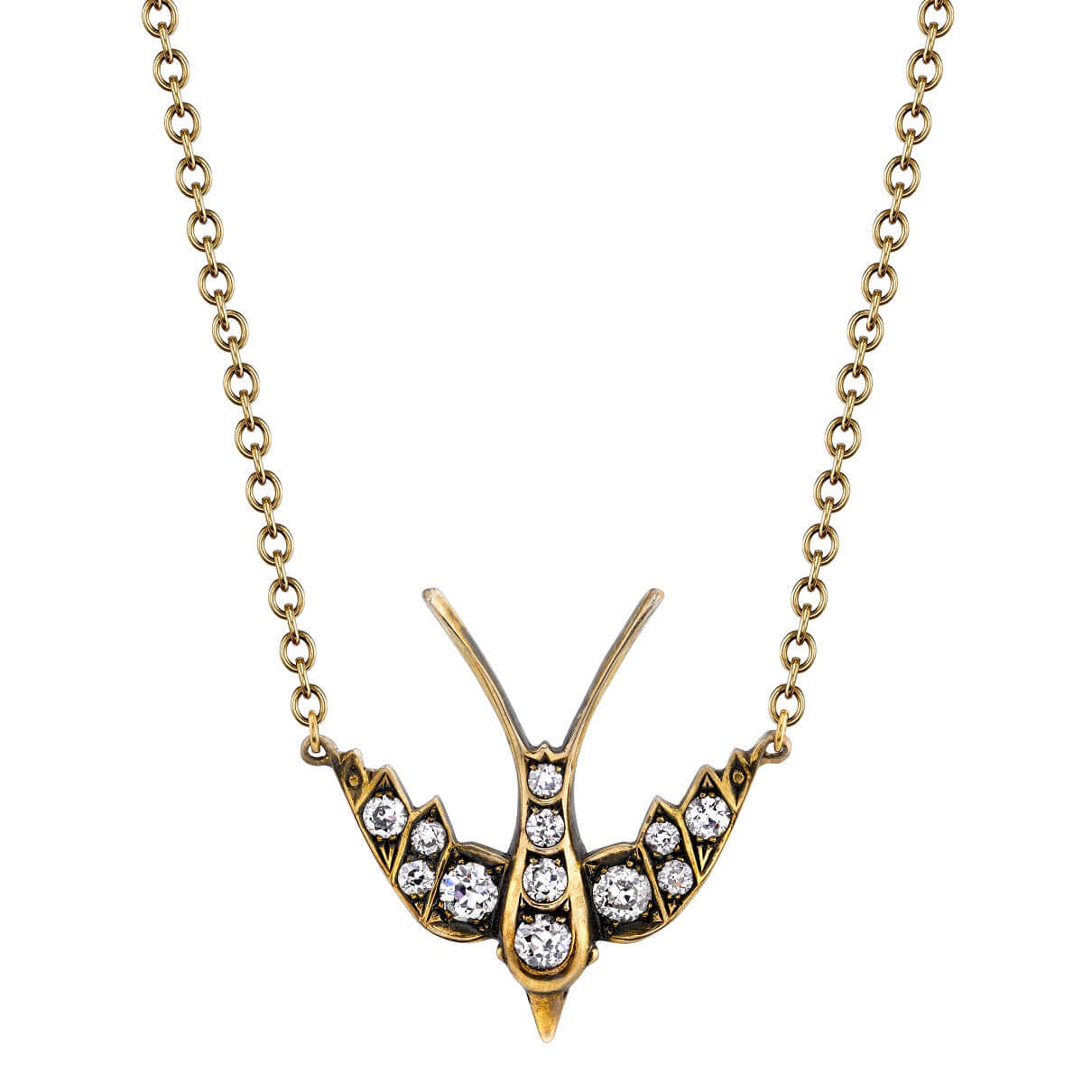 SINGLE STONE SMALL SWALLOW PENDANT NECKLACE featuring 0.32ctw G-H/VS old European cut diamonds set in a handcrafted 18K yellow and champagne gold Swallow pendant. Necklace measures 16".