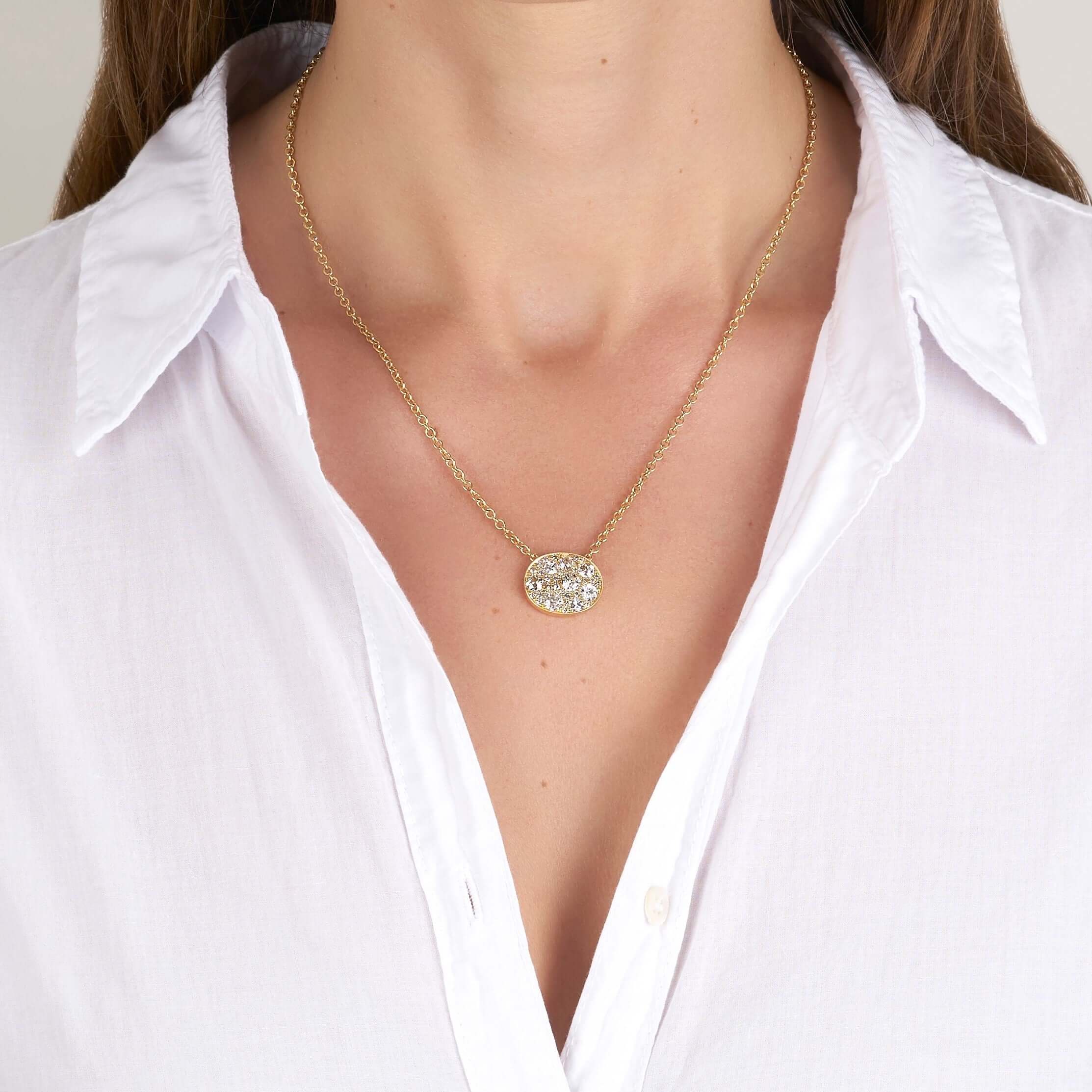 SINGLE STONE OVAL COBBLESTONE PENDANT NECKLACE featuring Approximately 1.80ctw various old cut and round brilliant cut diamonds set in a handcrafted 18K yellow gold pendant. Price may vary according to total diamond weight. Available in an oxidized or pol
