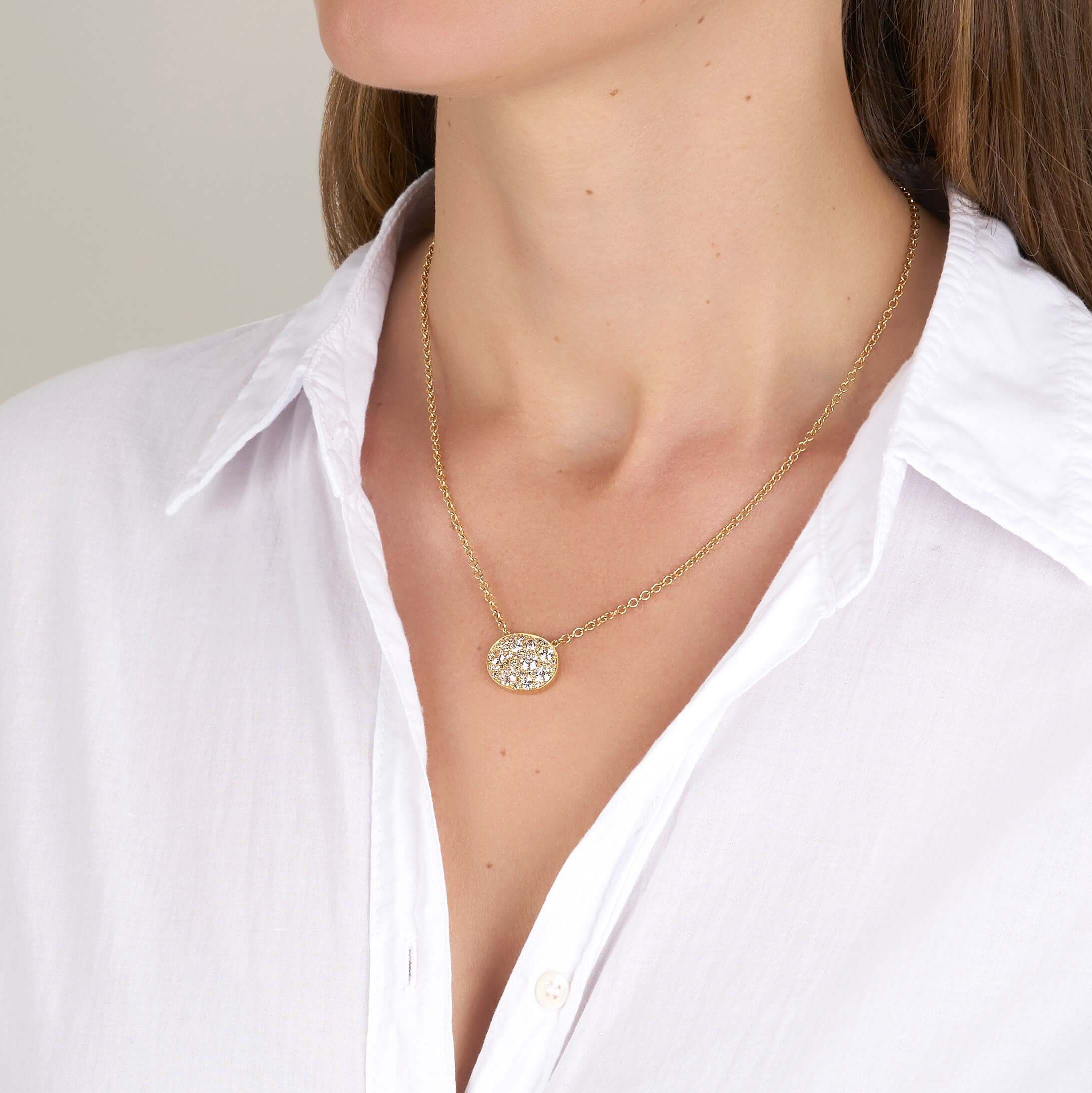 SINGLE STONE OVAL COBBLESTONE PENDANT NECKLACE featuring Approximately 1.80ctw various old cut and round brilliant cut diamonds set in a handcrafted 18K yellow gold pendant. Price may vary according to total diamond weight. Available in an oxidized or pol