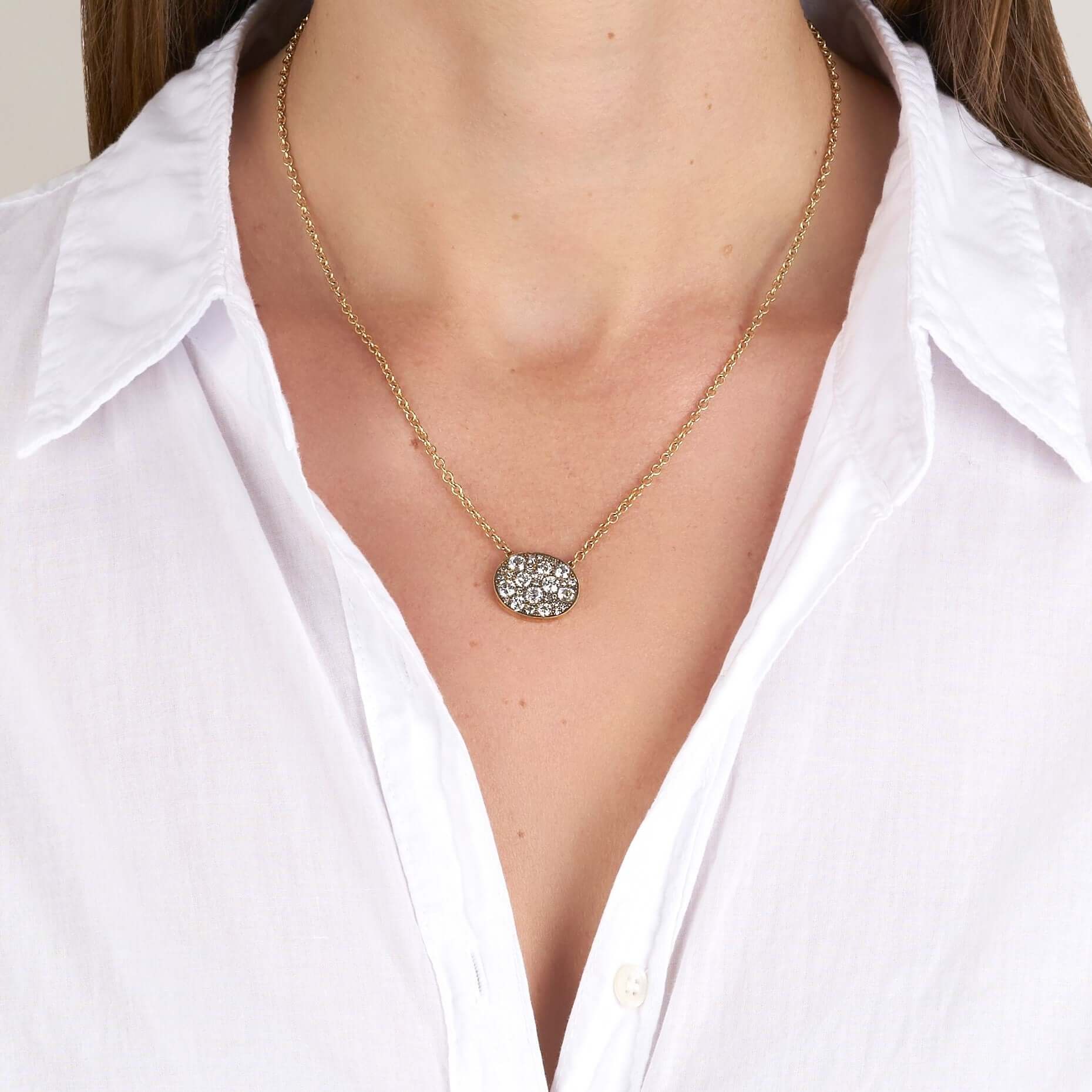 SINGLE STONE OVAL COBBLESTONE PENDANT NECKLACE featuring Approximately 1.80ctw various old cut and round brilliant cut diamonds set in a handcrafted 18K yellow gold pendant. Price may vary according to total diamond weight. Available in an oxidized or pol