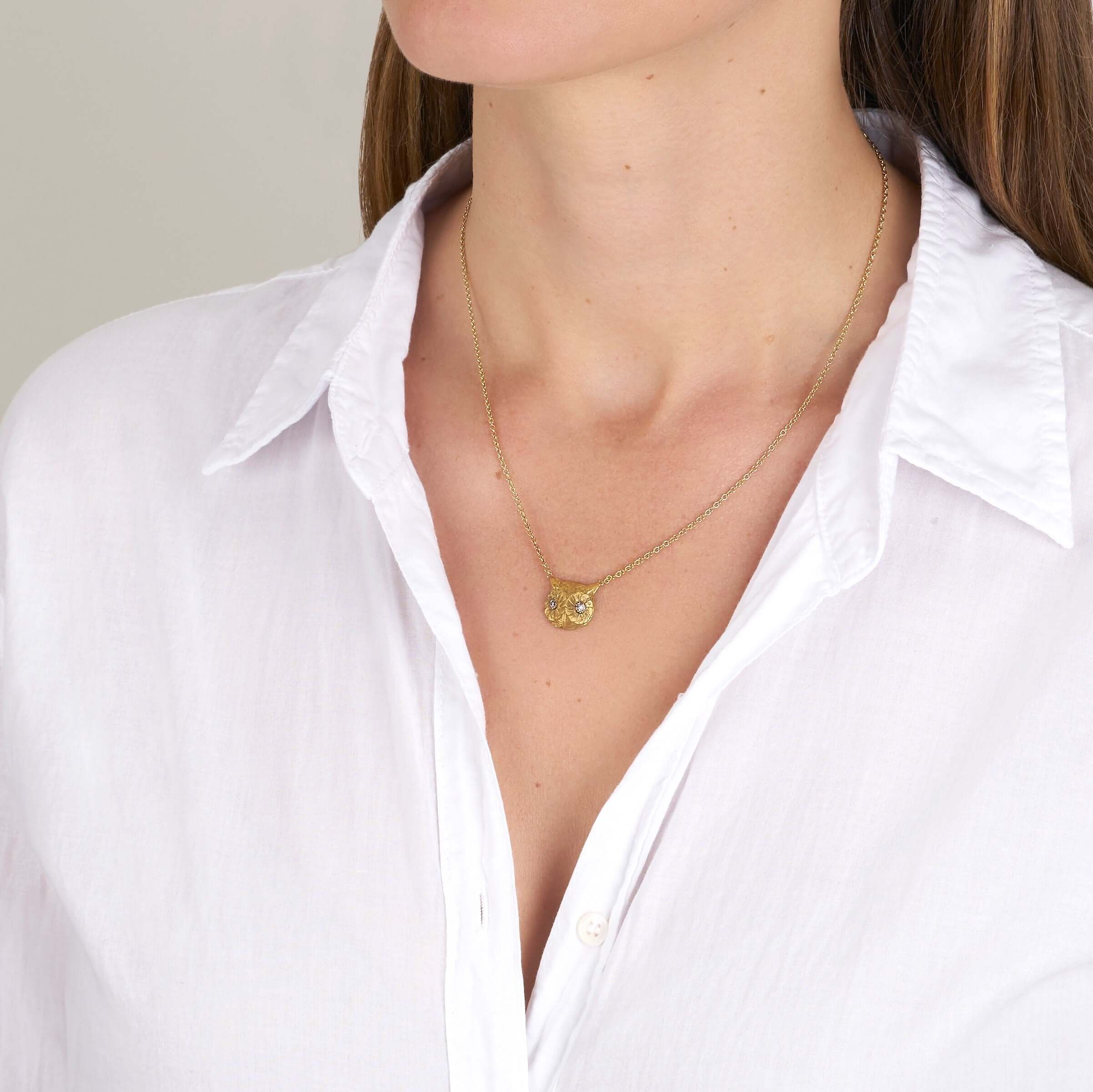 SINGLE STONE OWL PENDANT NECKLACE featuring 0.11ctw G-H/VS old European cut diamonds set in a handcrafted 18K yellow gold owl pendant necklace. Available in a polished or oxidized finish. Necklace measures 16".