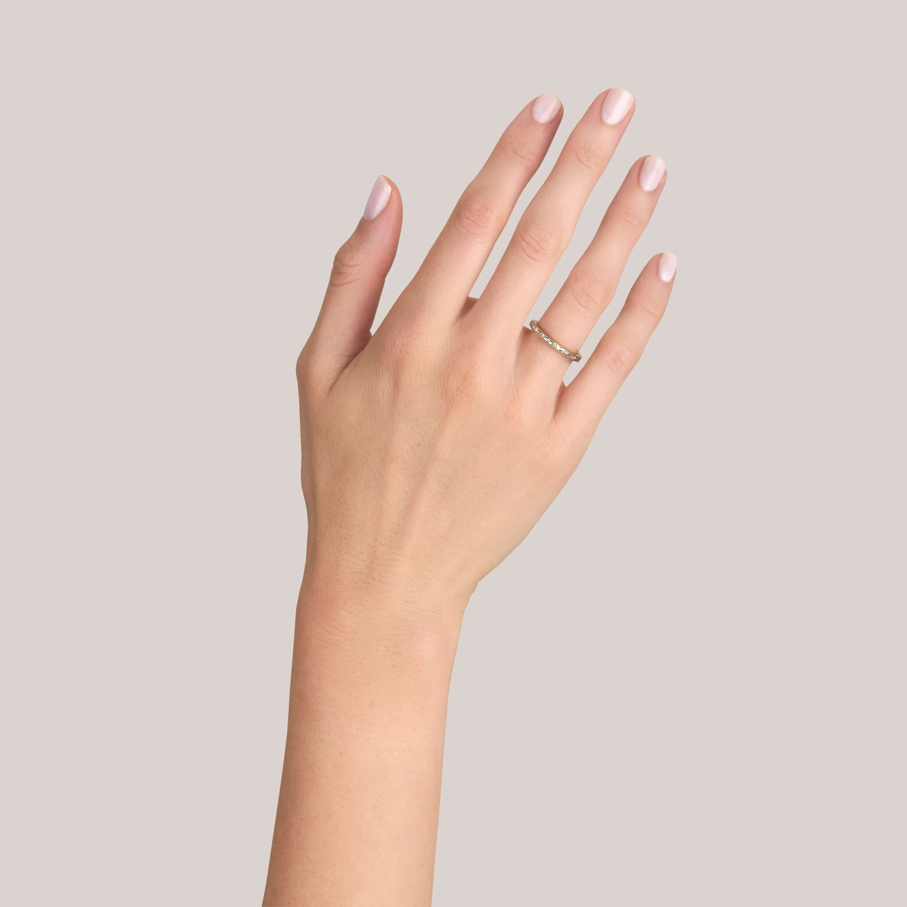 SINGLE STONE PAIGE BAND | Approximately 0.75ctw G-H/VS alternating French and old European cut diamonds channel set in a handcrafted eternity band. Approximate band with 2.1mm. Please inquire for additional customization.