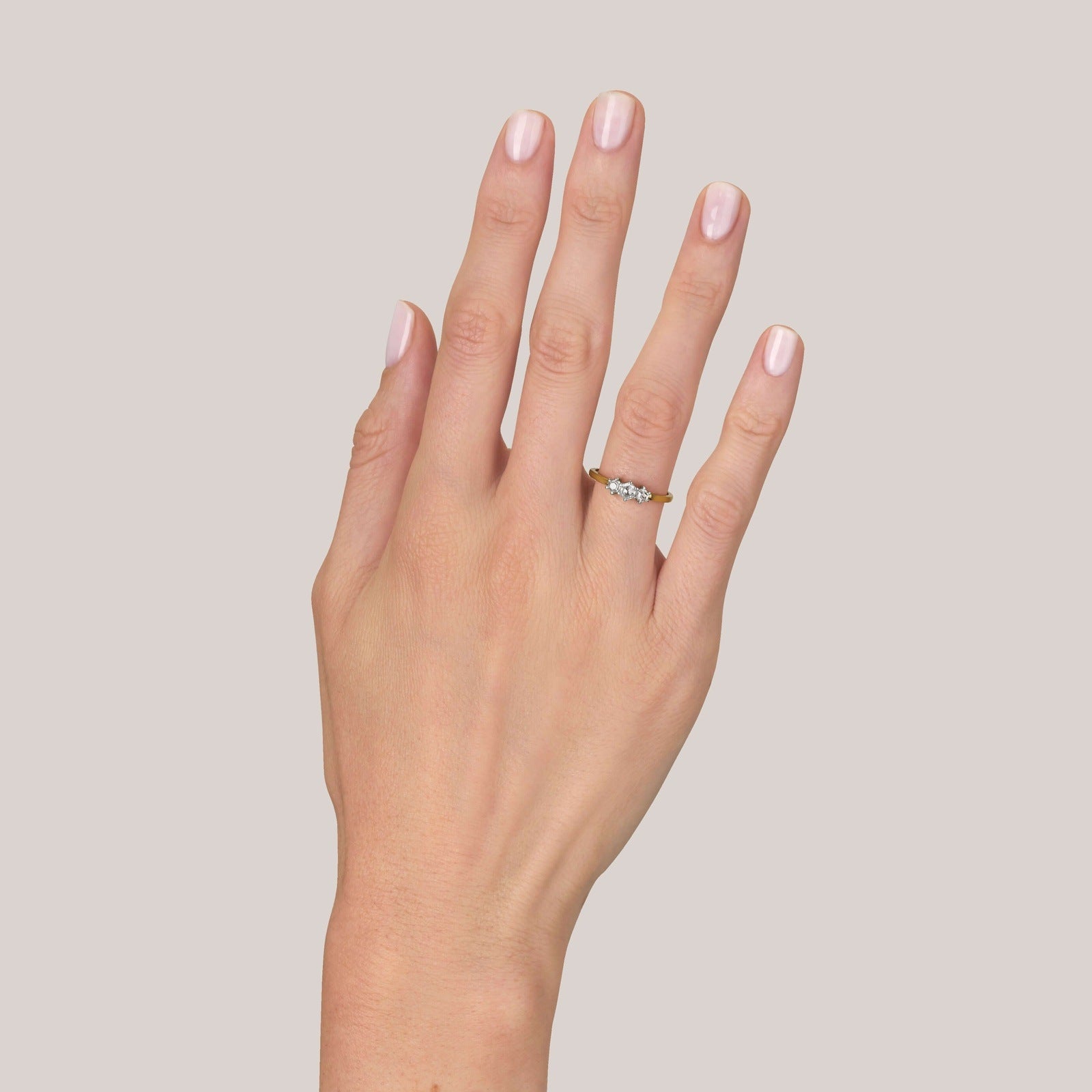 SINGLE STONE QUINCY RING featuring 0.42ctw hexagonal rose cut diamonds set in a handcrafted 18K yellow gold and platinum three stone mounting.