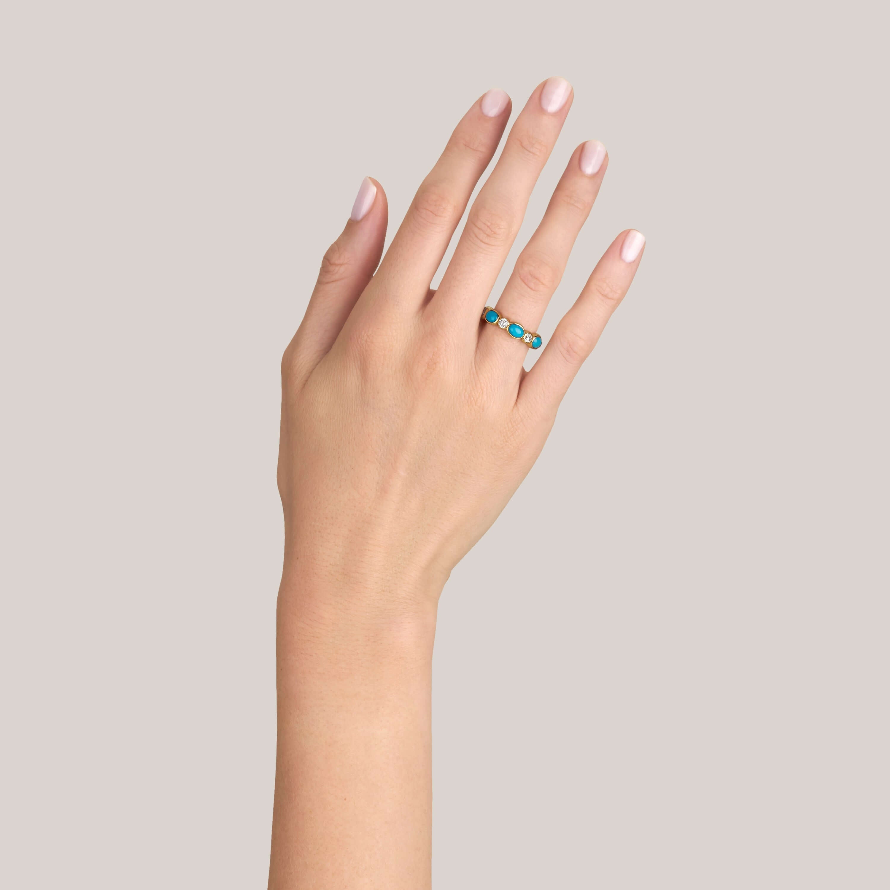 SINGLE STONE QUINN BAND | Approximately 0.90ctw G-H/VS-SI old European cut diamonds and alternating natural oval turquoise cabochons set in a handcrafted 18K gold eternity band. Approximate band width 5mm. Please inquire for additional customization.