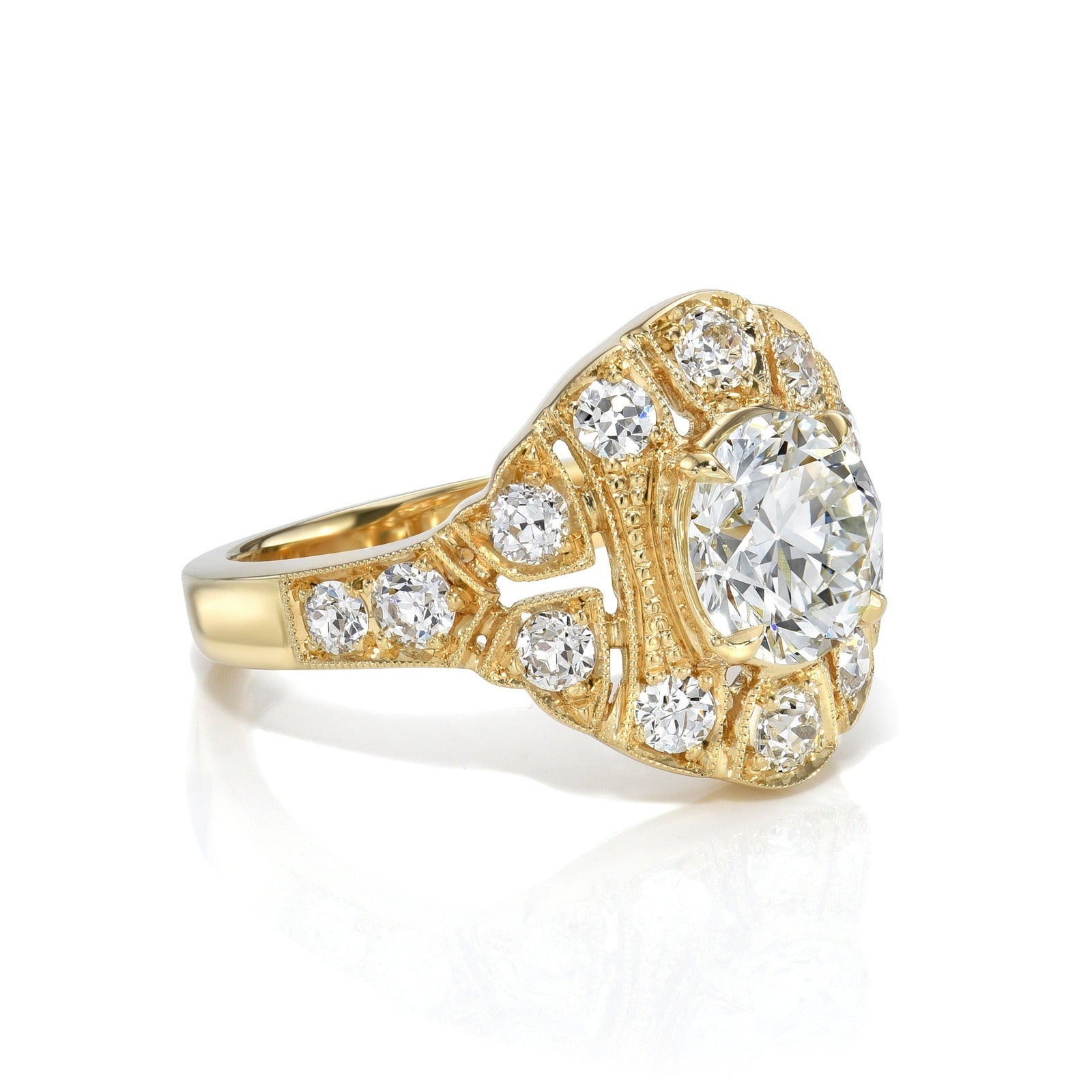 SINGLE STONE RENEE RING featuring 1.33ct H/VS1 GIA certified transitional cut diamond prong set with 0.78ctw old European cut accent diamonds set in a handcrafted 18K yellow gold mounting.