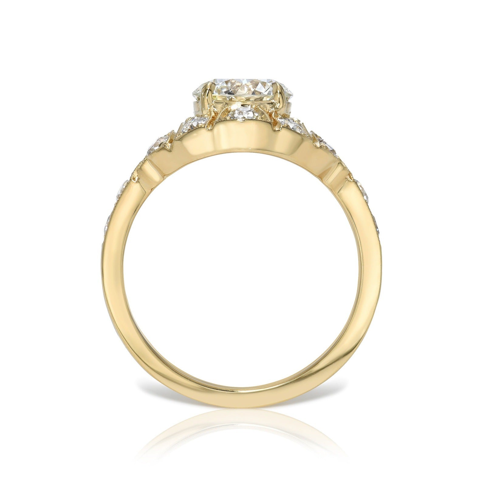 SINGLE STONE RENEE RING featuring 1.33ct H/VS1 GIA certified transitional cut diamond prong set with 0.78ctw old European cut accent diamonds set in a handcrafted 18K yellow gold mounting.