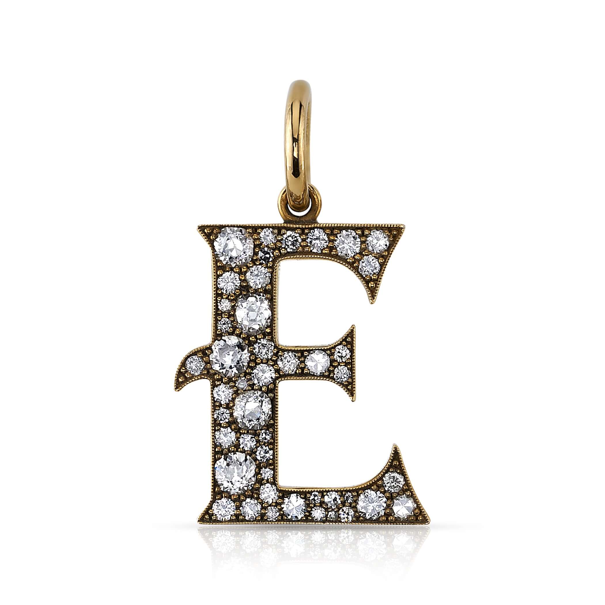 SINGLE STONE LARGE COBBLESTONE LETTERS PENDANT featuring Approximately 0.95ctw-2.75ctw varying old cut and round brilliant cut diamonds set in a handcrafted 18K yellow gold letter pendant. Letters are approximately 1" tall. Available in an oxidized or pol