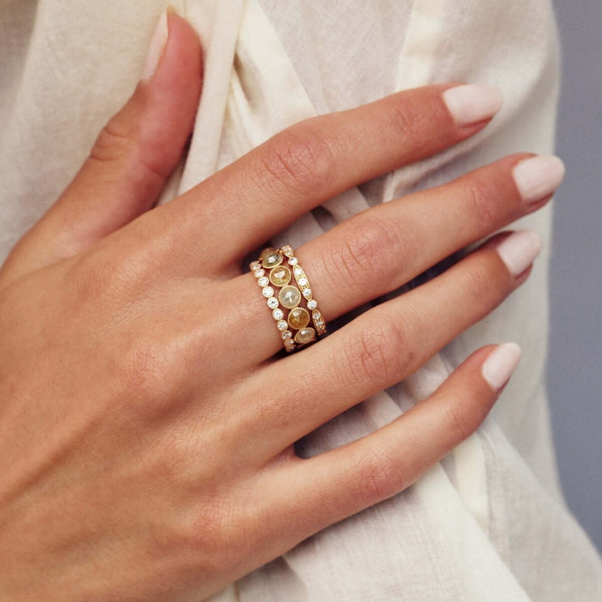 SINGLE STONE MINI GABBY BAND | Approximately 0.70ctw old European cut diamonds set in a handcrafted bezel set eternity band. Approximate band width 2.4mm. Please inquire for additional customization,