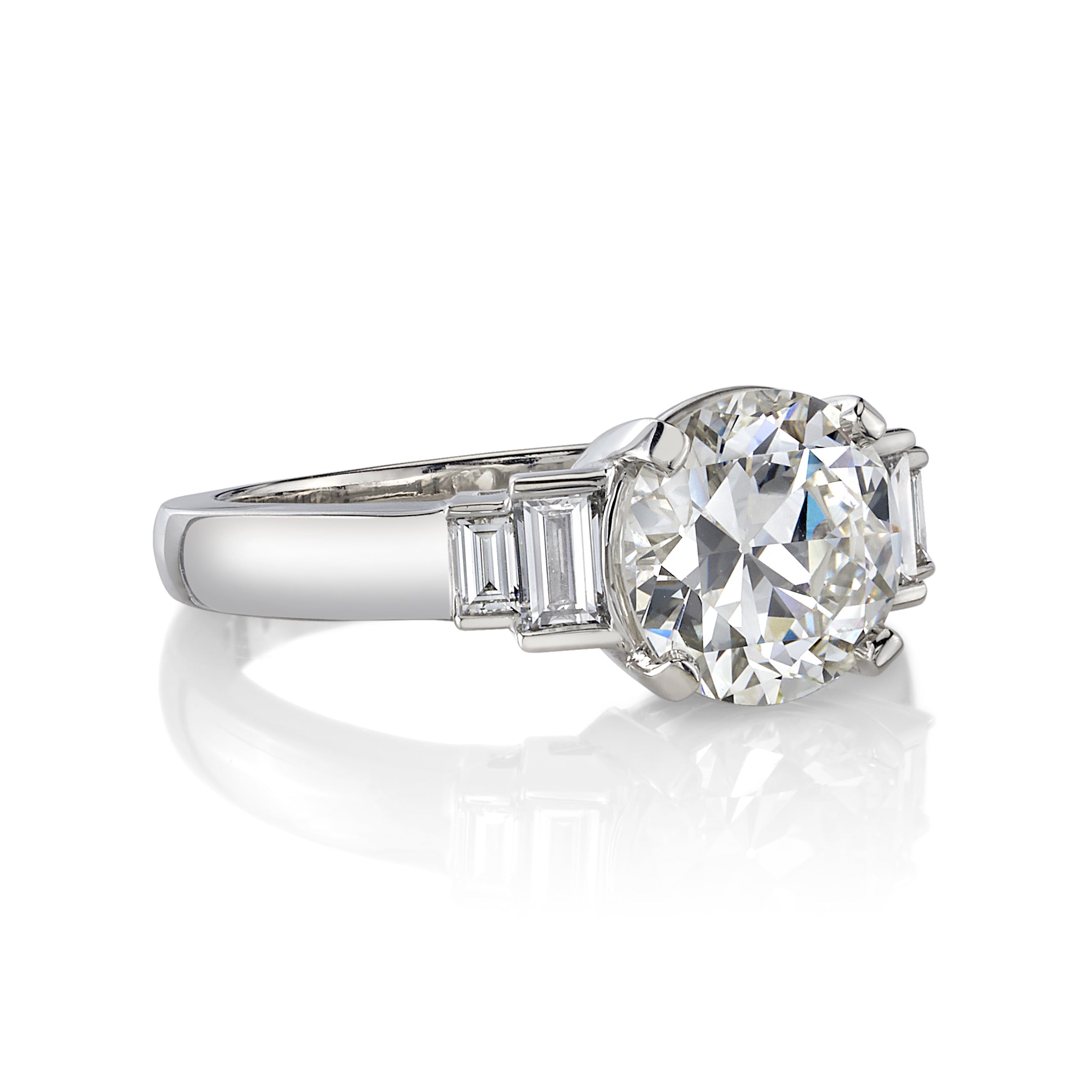 SINGLE STONE SCOUT RING featuring 2.03ct H/VVS2 GIA certified old European cut diamond with 0.31ctw baguette cut diamond accents set in a handcrafted platinum mounting.