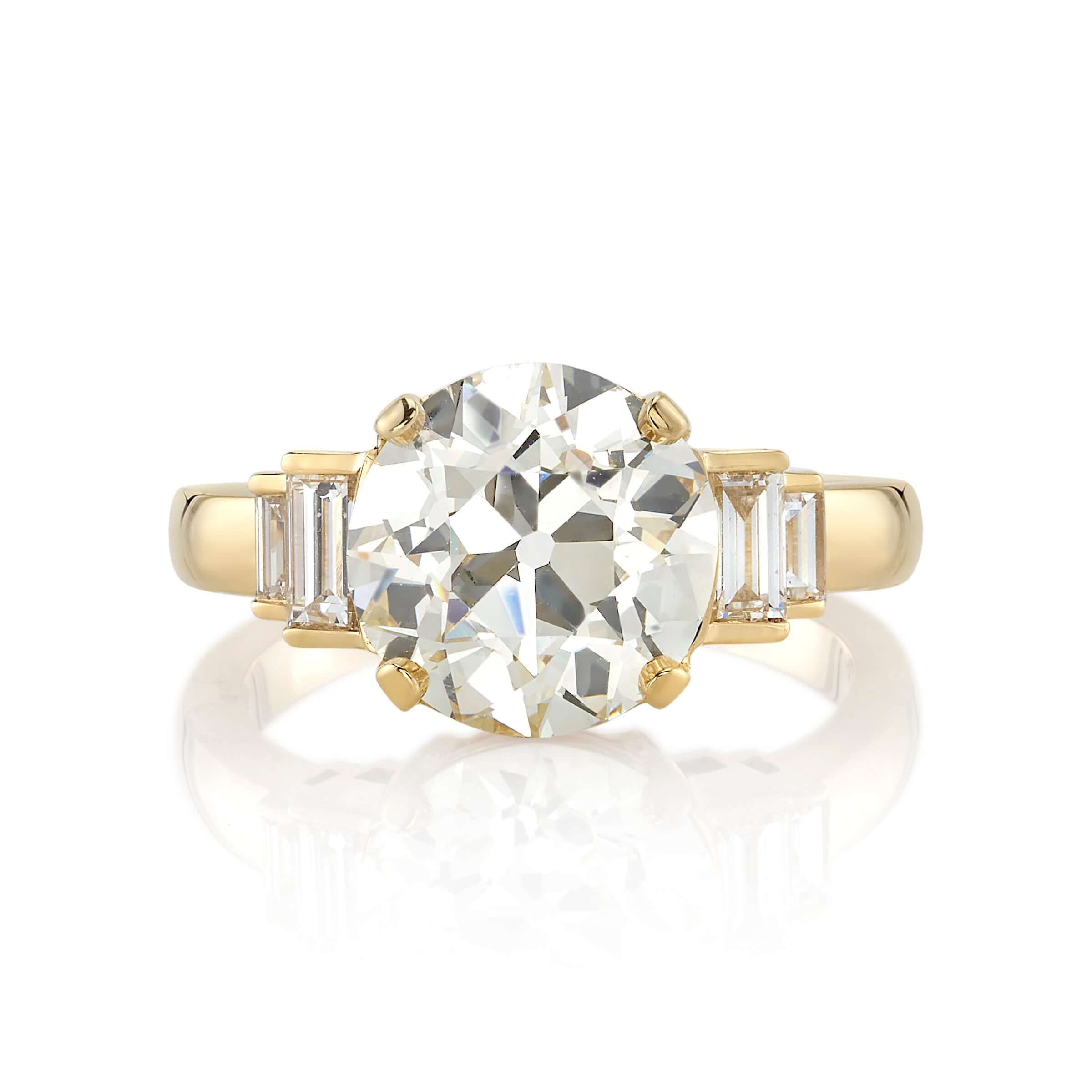 SINGLE STONE SCOUT RING featuring 3.47ct L/VS1 GIA certified old European cut diamond with 0.44ctw Baguette cut diamond accents set in a handcrafted 18K yellow gold mounting.