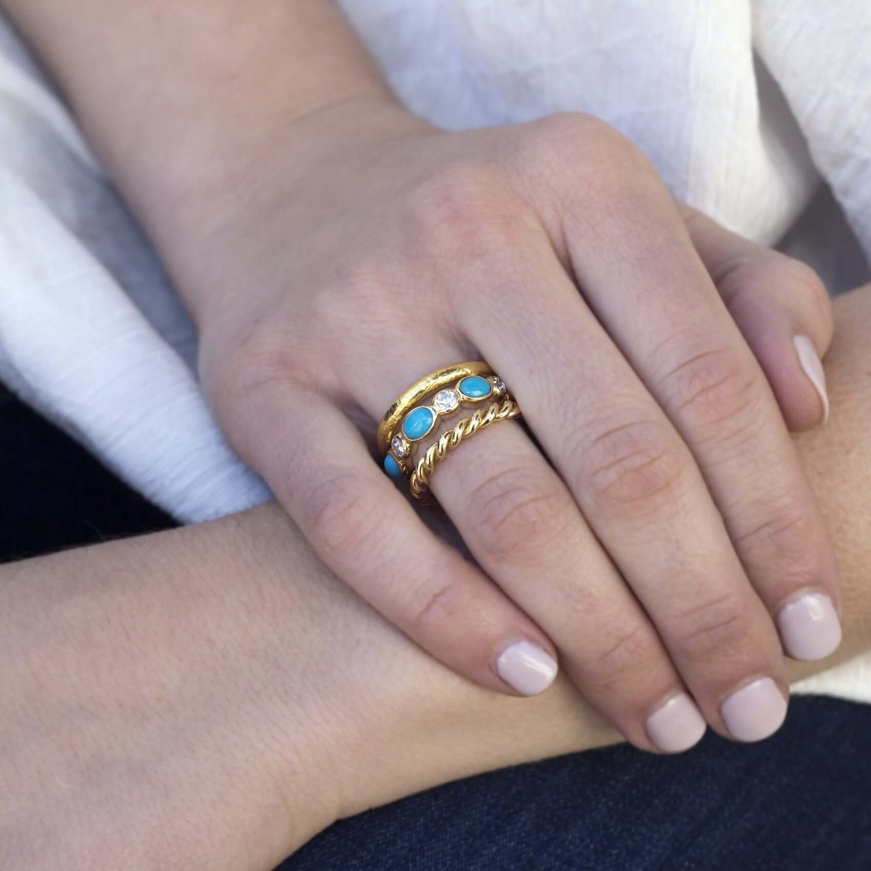 SINGLE STONE QUINN BAND | Approximately 0.90ctw G-H/VS-SI old European cut diamonds and alternating natural oval turquoise cabochons set in a handcrafted 18K gold eternity band. Approximate band width 5mm. Please inquire for additional customization.