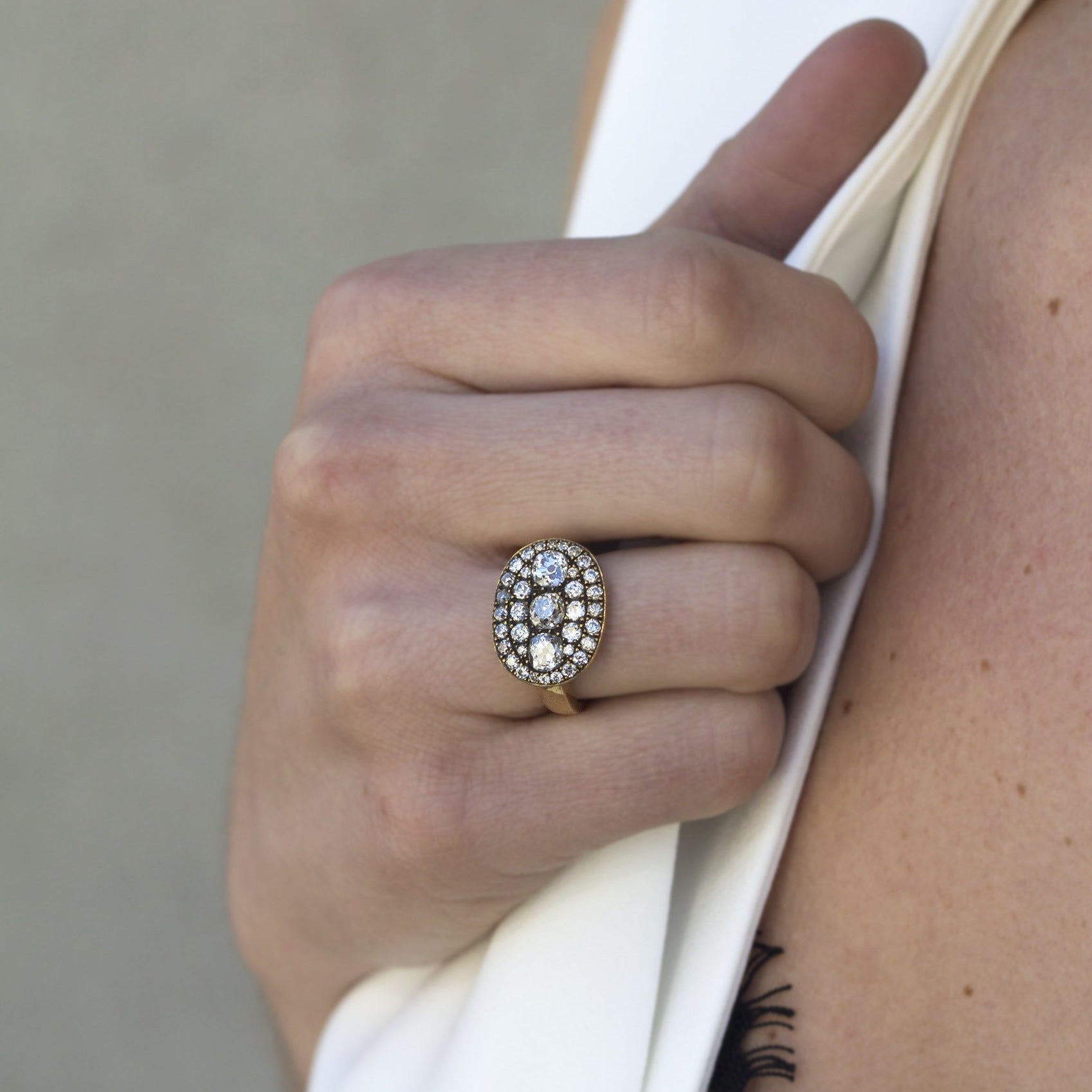 SINGLE STONE LEXY RING featuring 2.36ctw VS/SI varying old cut and round brilliant cut diamonds set in a handcrafted, oxidized 18K yellow gold mounting.