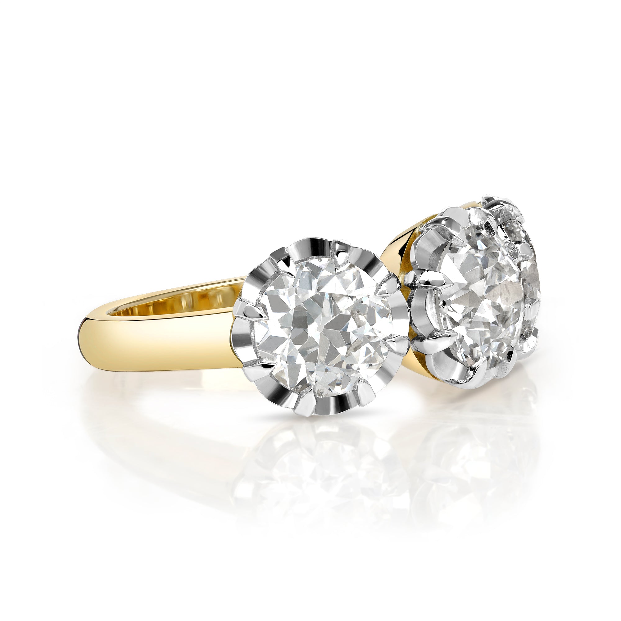 SINGLE STONE THREE STONE JOLENE RING featuring 1.34ct H/SI2 old European cut diamond with 2.05ctw old European cut accent diamonds prong set in a handcrafted 18K yellow gold and platinum mounting.